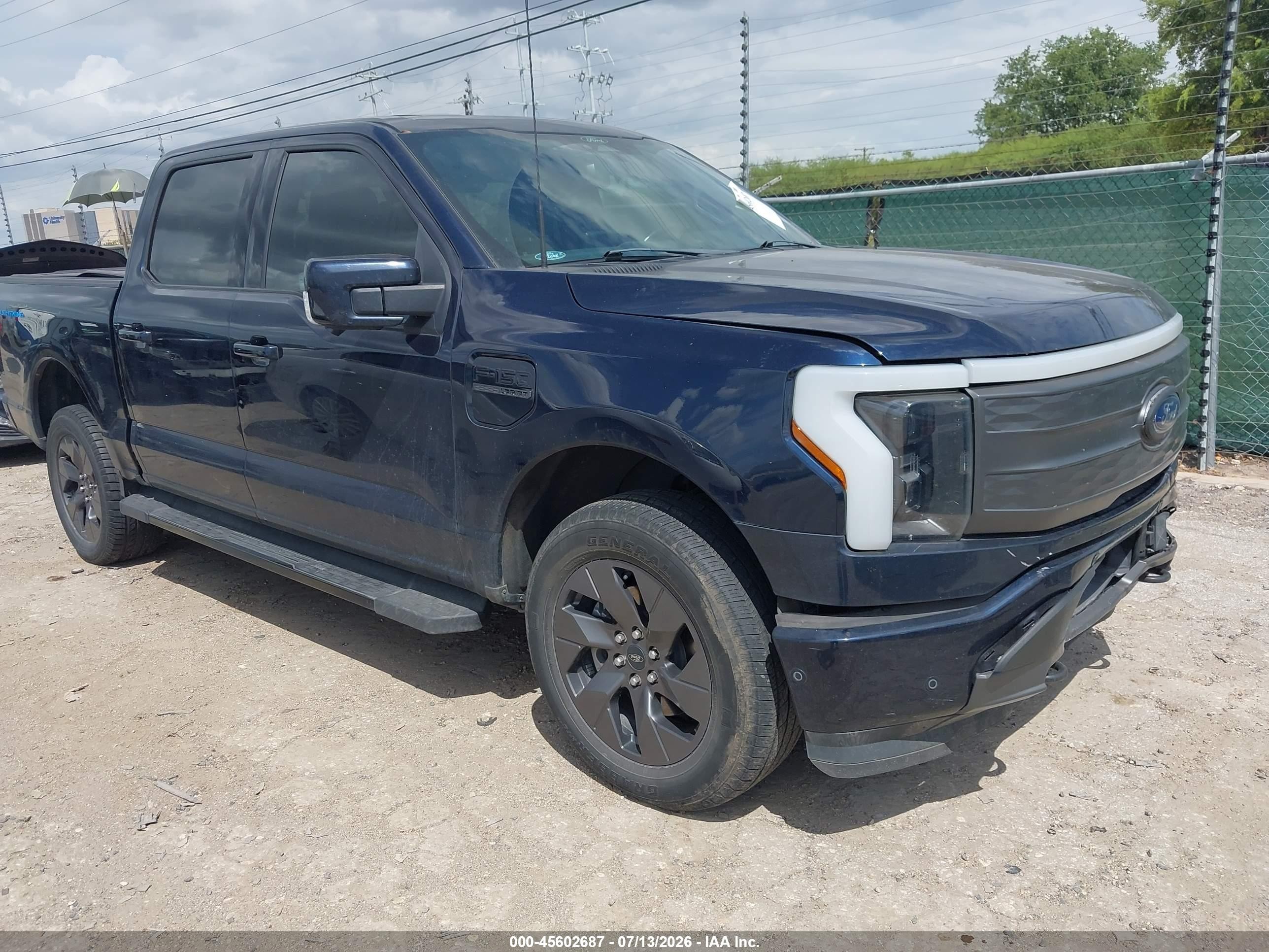 2022 Ford F-150 Lightning VIN 1FTVW1EL5NWG15533 — IAAI salvage auction photo