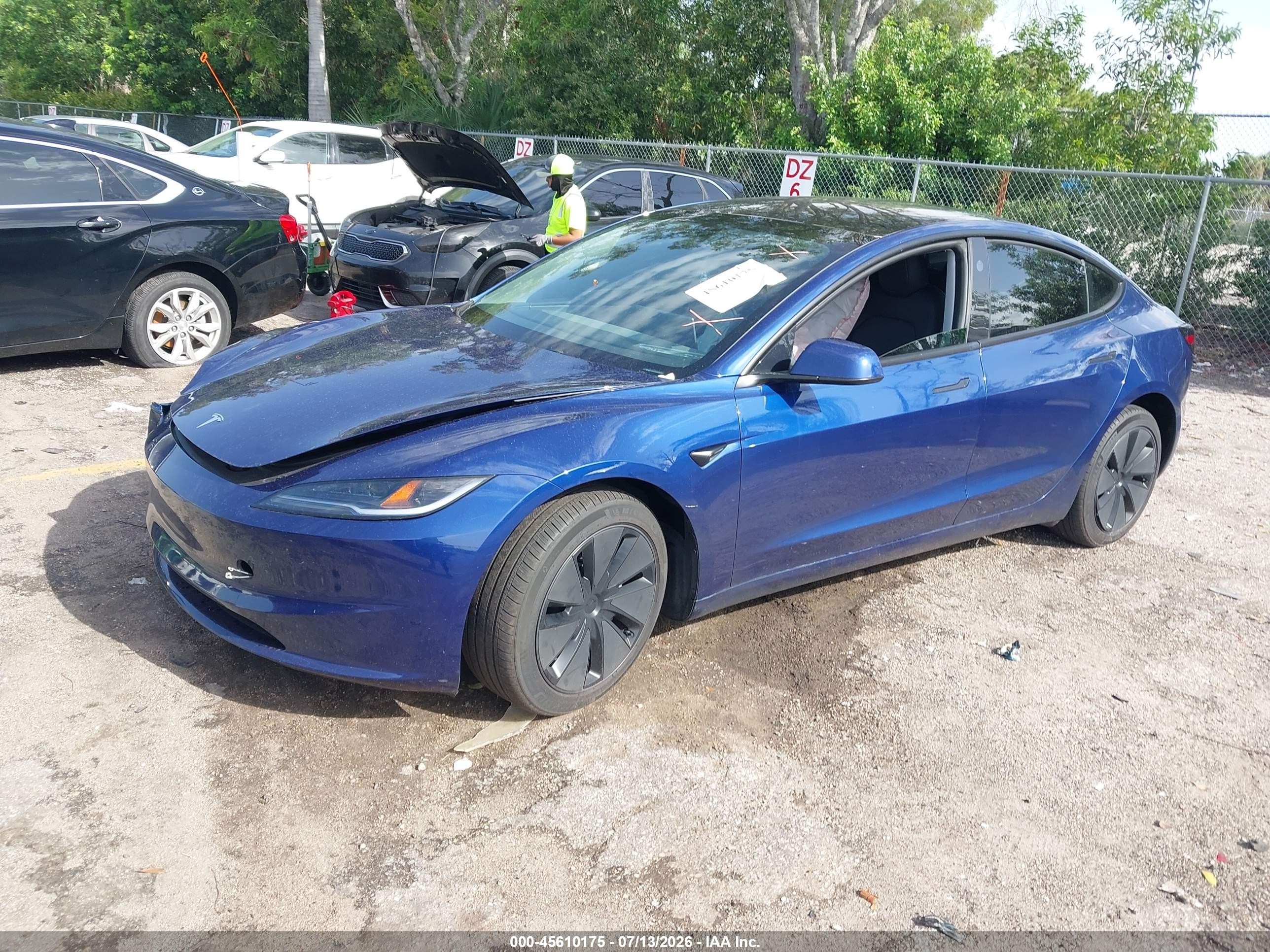 2025 Tesla Model 3 VIN 5YJ3E1EA7SF010213 IAAI salvage auction — Unknown, Rebuildable (Florida), sold $12,500 on 2026-10-05 (photo 2)
