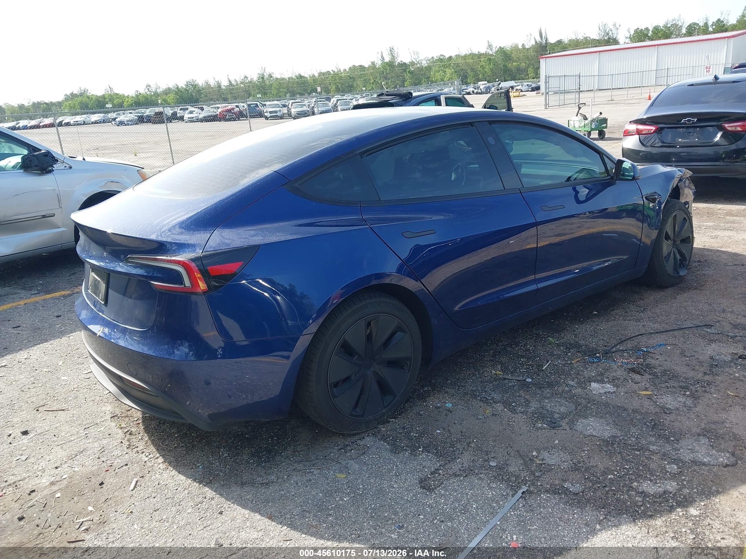 2025 Tesla Model 3 VIN 5YJ3E1EA7SF010213 IAAI salvage auction — Unknown, Rebuildable (Florida), sold $12,500 on 2026-10-05 (photo 4)