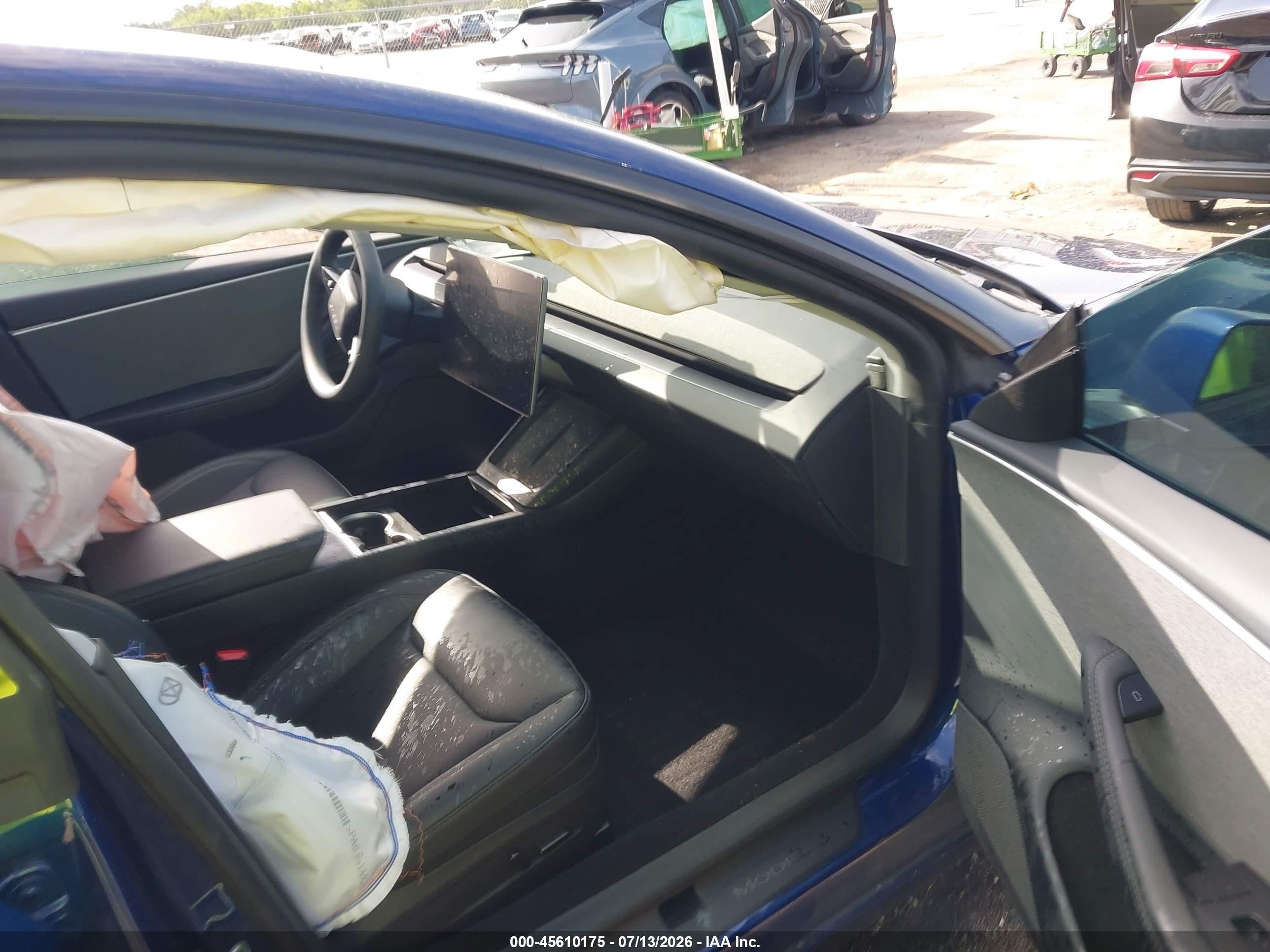 2025 Tesla Model 3 VIN 5YJ3E1EA7SF010213 IAAI salvage auction — Unknown, Rebuildable (Florida), sold $12,500 on 2026-10-05 (photo 5)