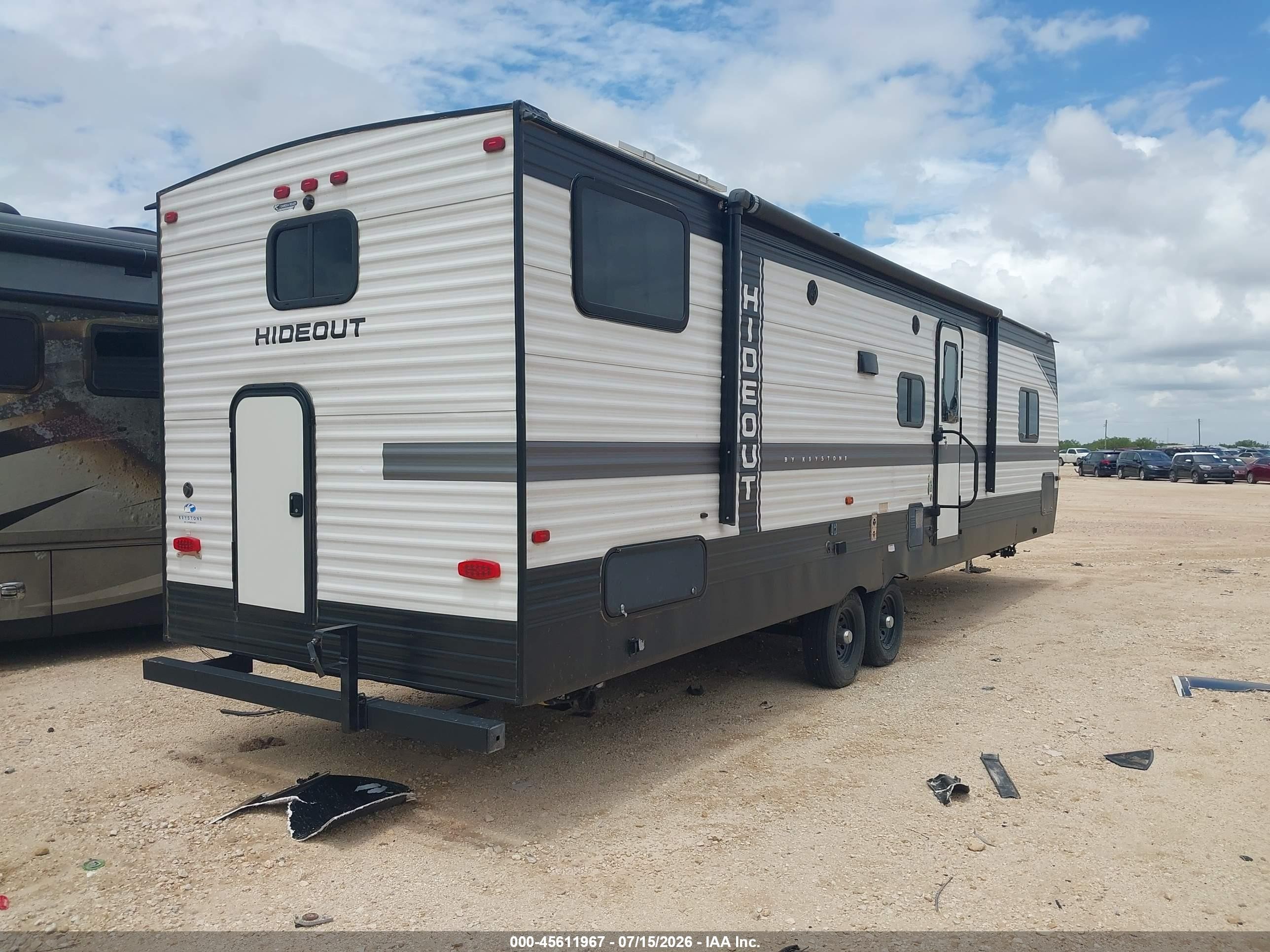 2022 Keystone M-32lbh VIN 4YDTH1R20N7248714 IAAI salvage auction — Hail, Original (Texas), sold $7,450 on 2026-10-15 (photo 4)