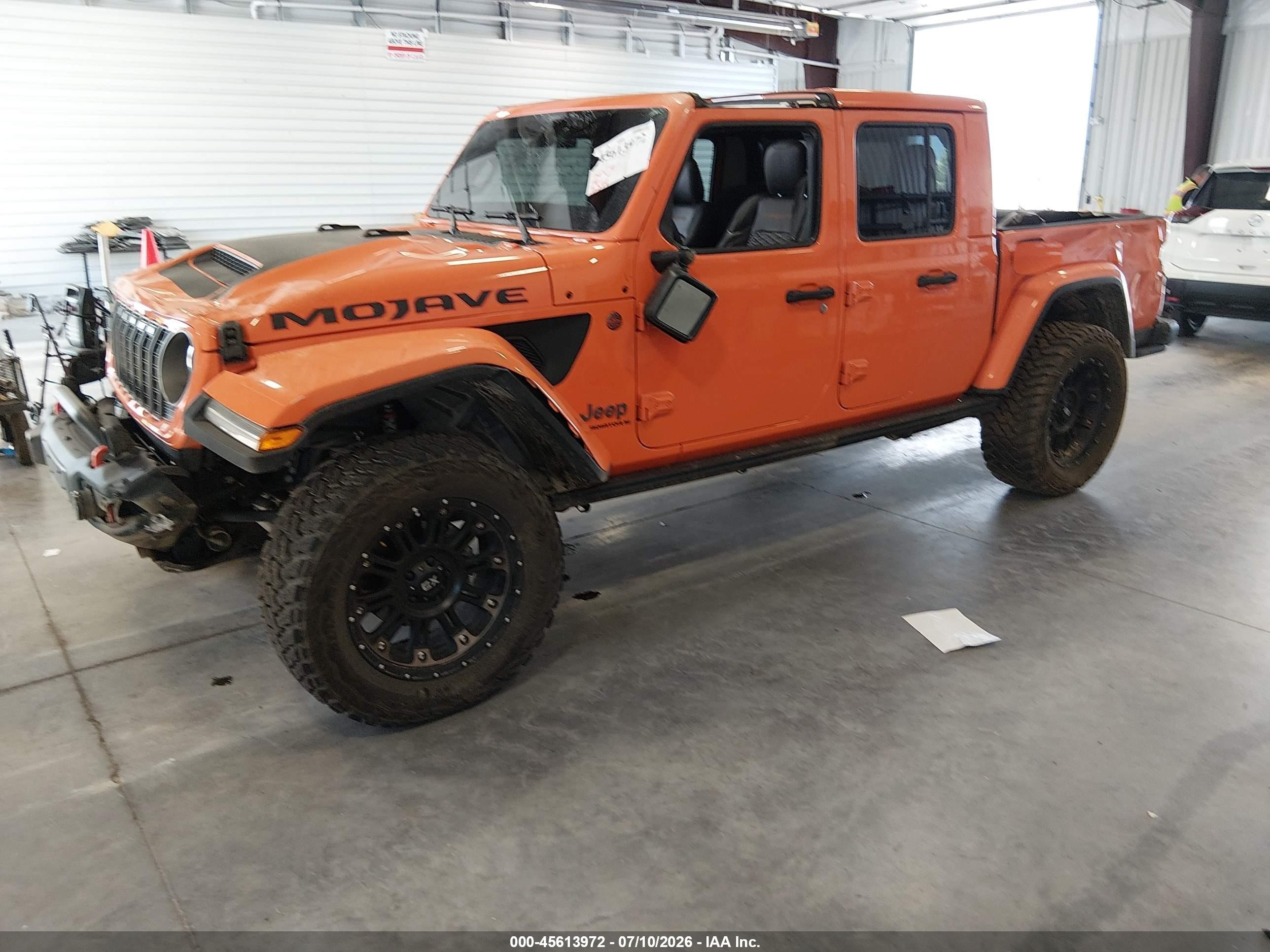 2025 Jeep Gladiator VIN 1C6RJTEG3SL534243 IAAI salvage auction — Side, Salvage (Colorado), sold $15,400 on 2026-10-09 (photo 2)