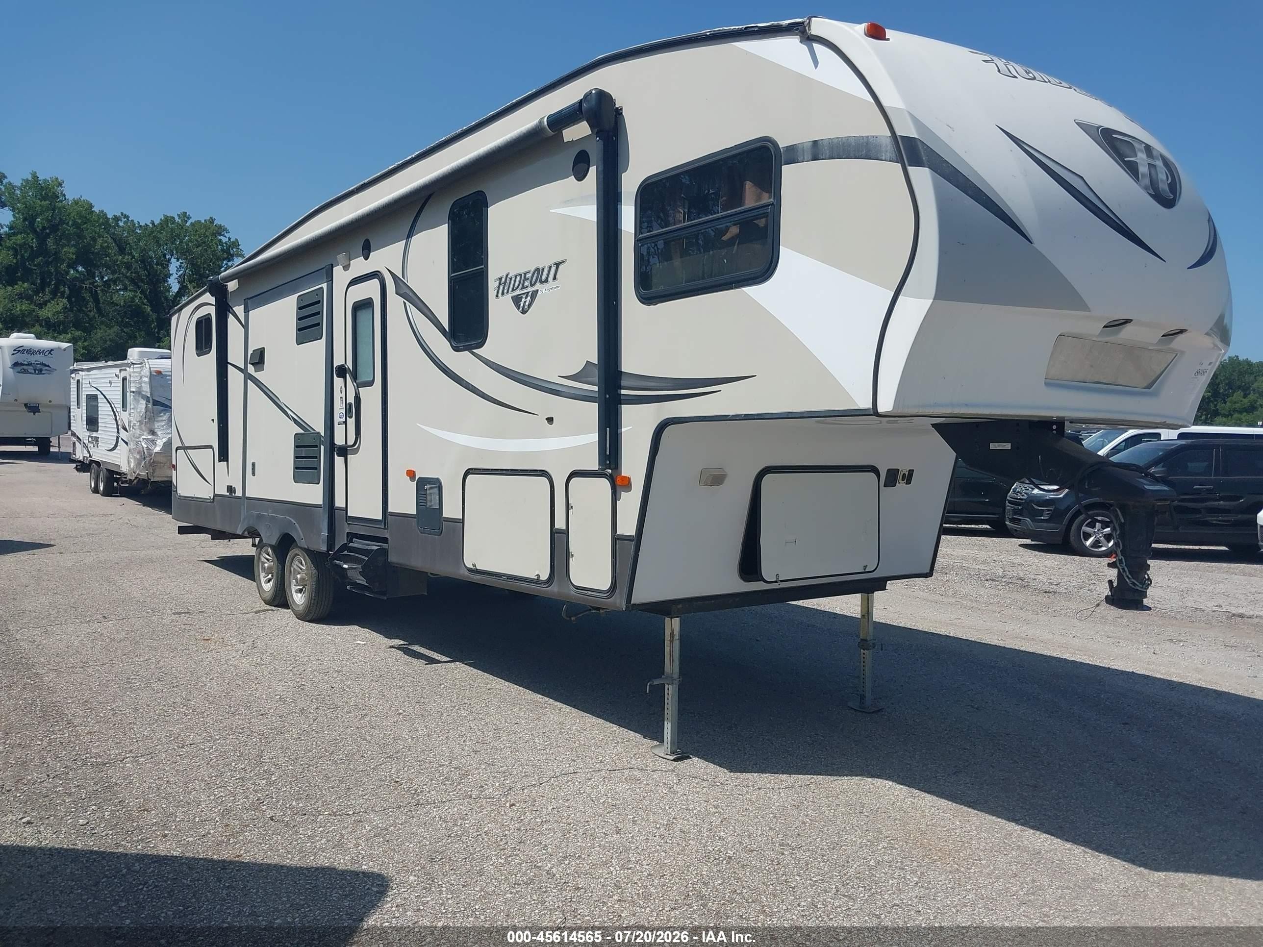 2015 Keystone 298bhds VIN 4YDF29828F7202113 IAAI salvage auction — Hail, Salvage (Missouri), sold $4,000 on 2026-10-03 (photo 1)