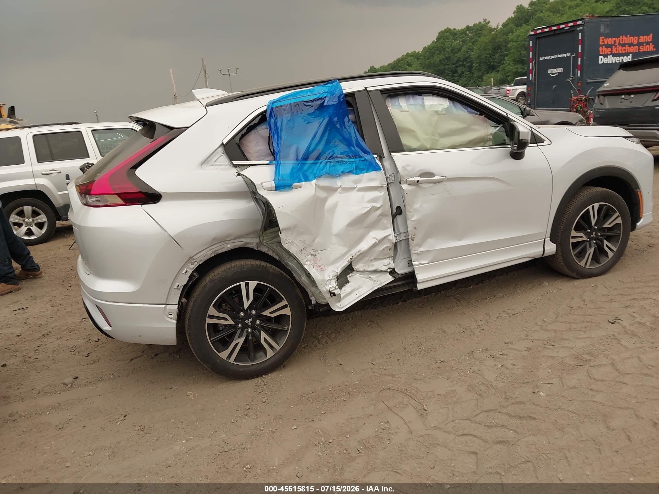 2024 Mitsubishi Eclipse cross VIN JA4ATWAA9RZ065826 IAAI salvage auction — Side, Salvage (Massachusetts), sold $6,800 on 2026-09-08 (photo 4)