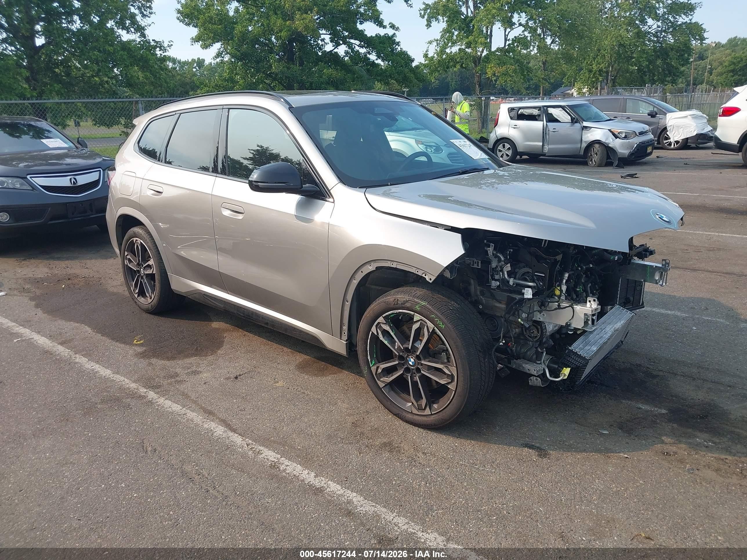 2023 BMW X1 VIN WBX73EF00P5Y18953 — IAAI salvage auction photo