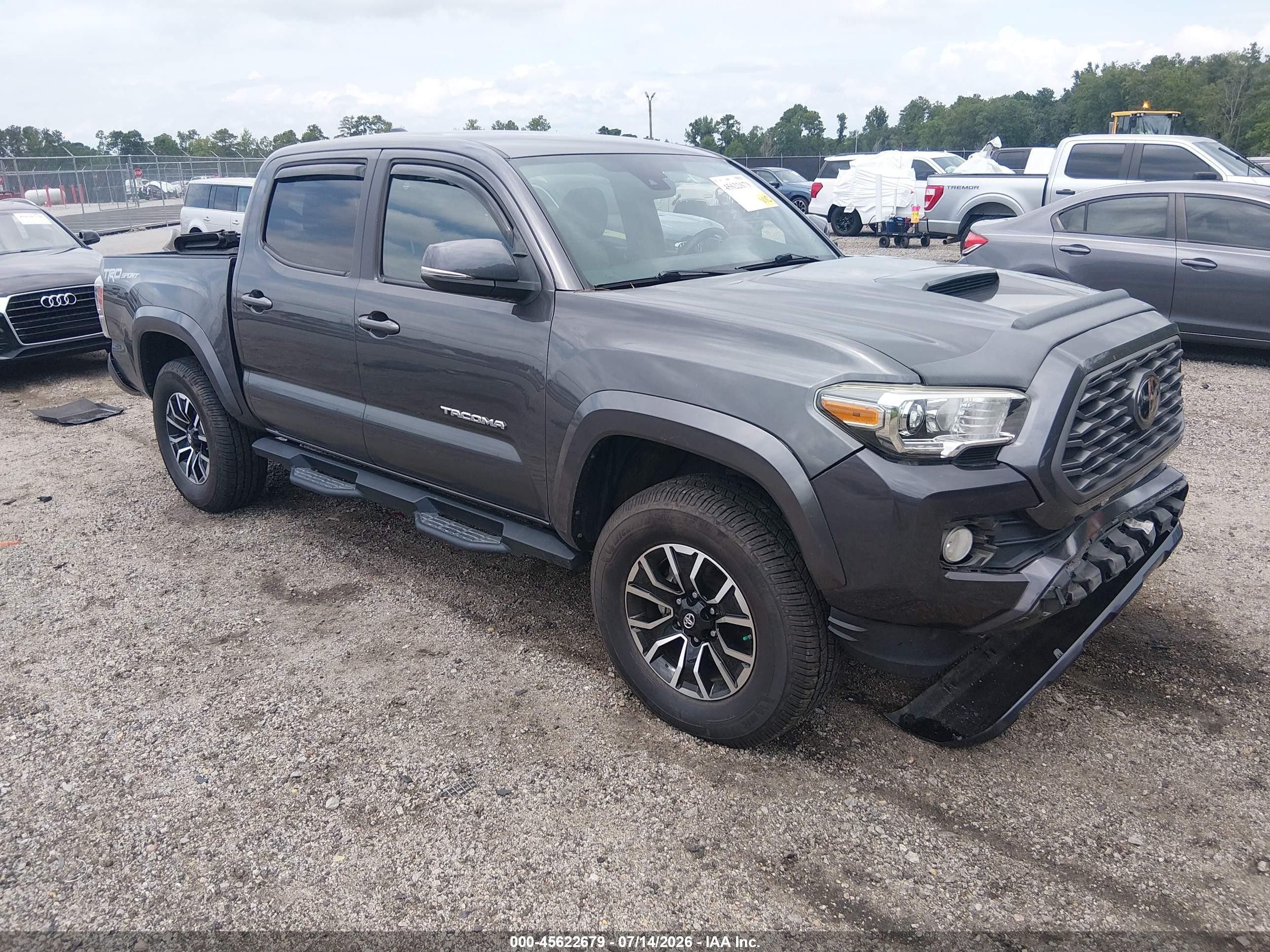 2021 Toyota Tacoma VIN 5TFAZ5CN9MX099574 — IAAI salvage auction photo
