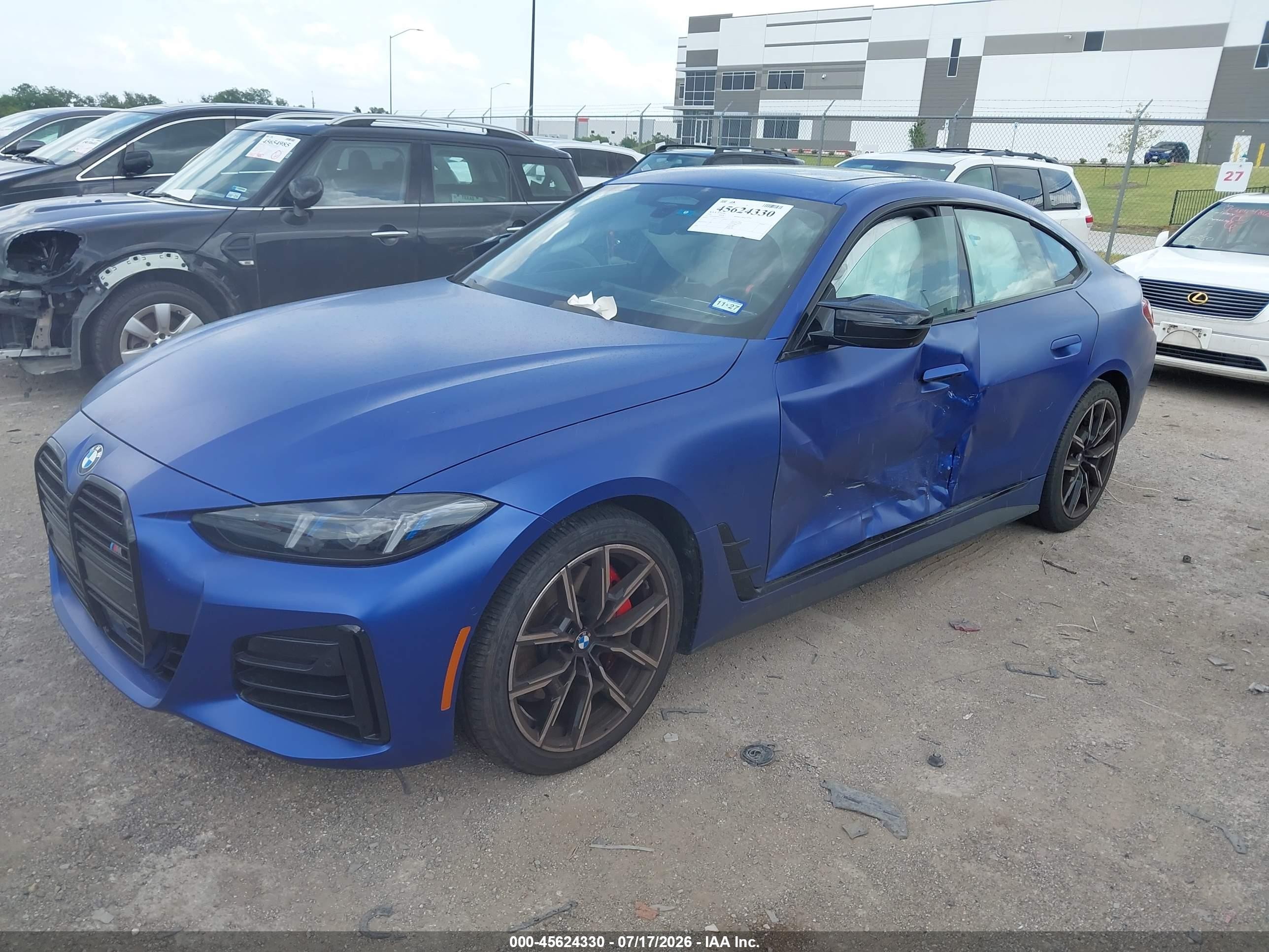 2026 BMW M440i Gran Coupe VIN WBA63FB08TFV88407 IAAI salvage auction — Side, Salvage (Texas), sold $32,750 on 2026-08-20 (photo 2)
