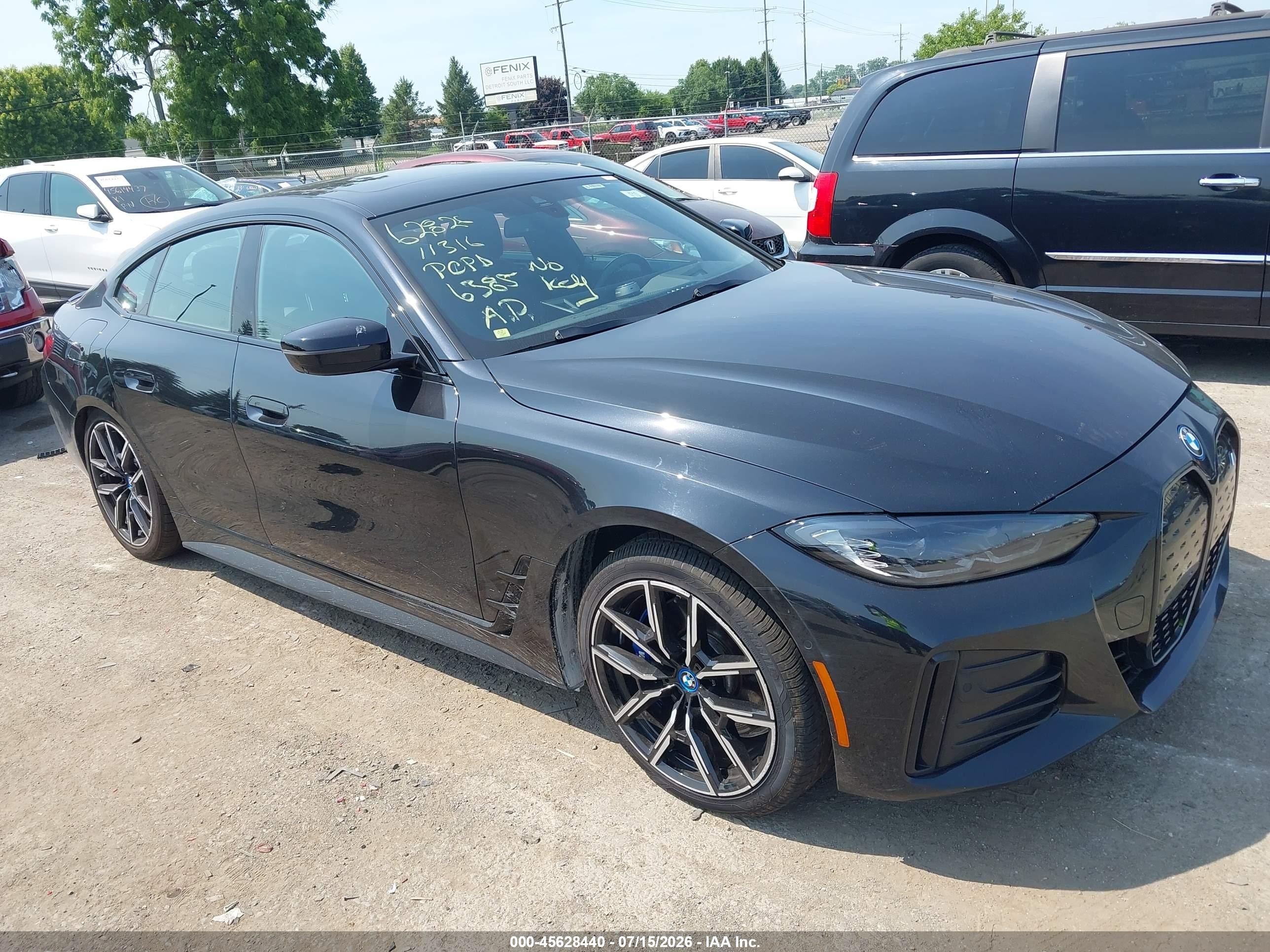 2024 BMW i4 VIN WBY83FB0XRFR76385 — IAAI salvage auction photo