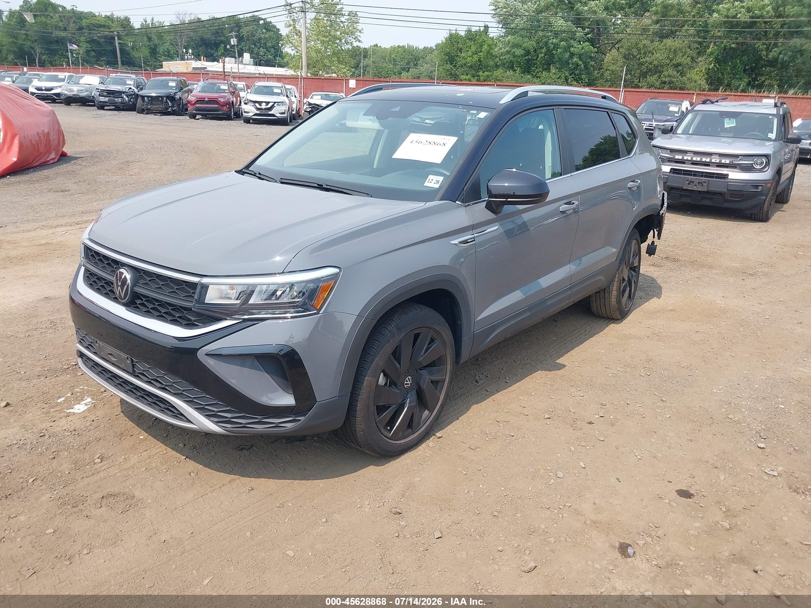 2024 Volkswagen Taos VIN 3VVVX7B28RM033400 IAAI salvage auction — Side, Salvage (Idaho), sold $8,500 on 2026-09-15 (photo 2)