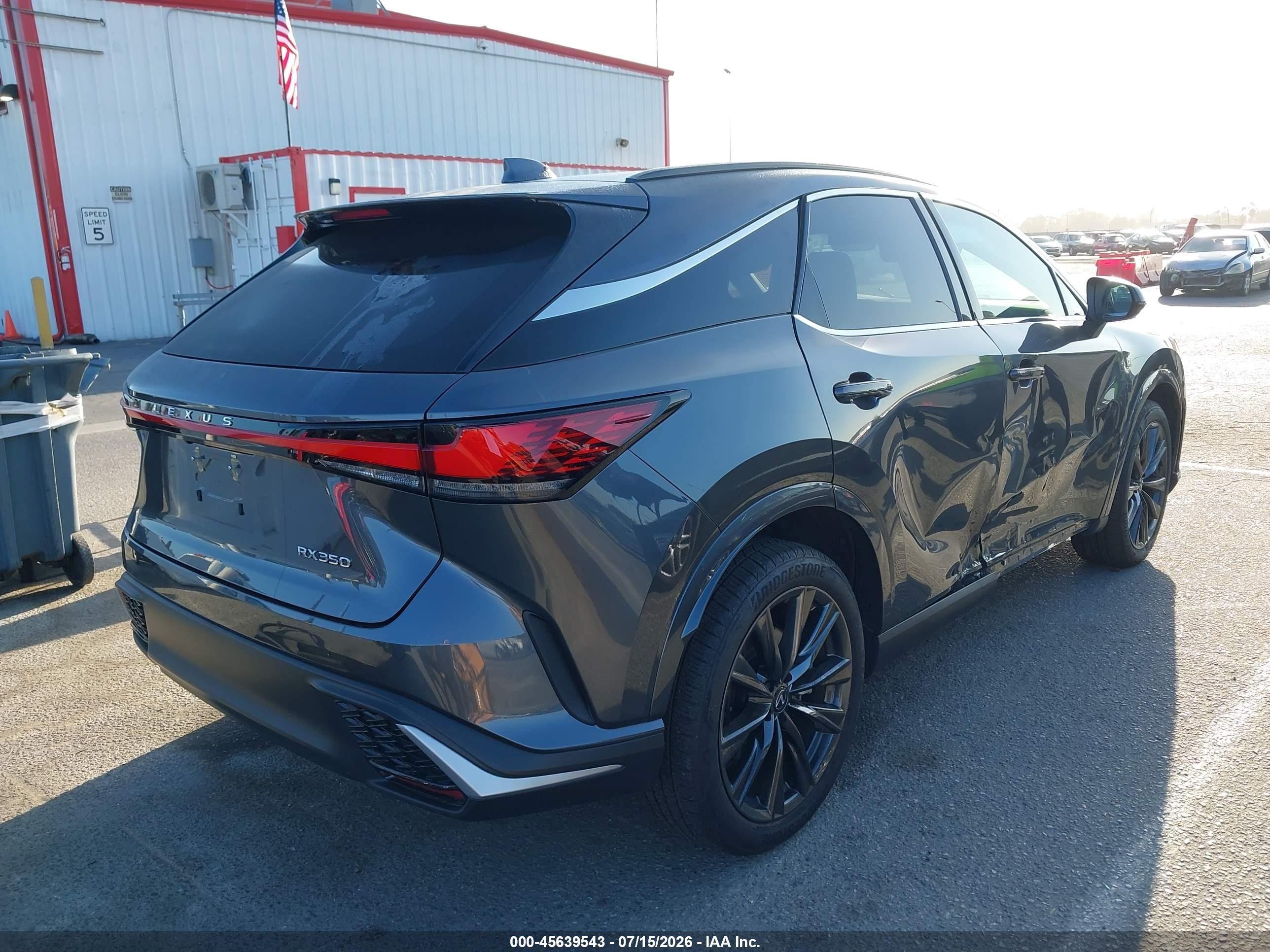 2025 Lexus Rx VIN 2T2BAMBA1SC068363 IAAI salvage auction — Side, Salvage (California), sold $28,500 on 2026-09-10 (photo 4)