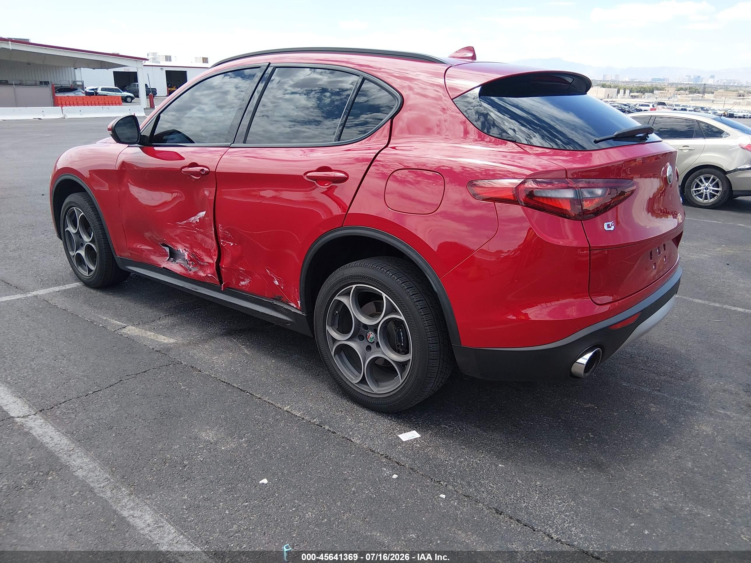 2018 Alfa romeo Stelvio VIN ZASFAKPN2J7B77203 IAAI salvage auction — Side, Salvage (Nevada), sold $5,500 on 2026-09-05 (photo 3)