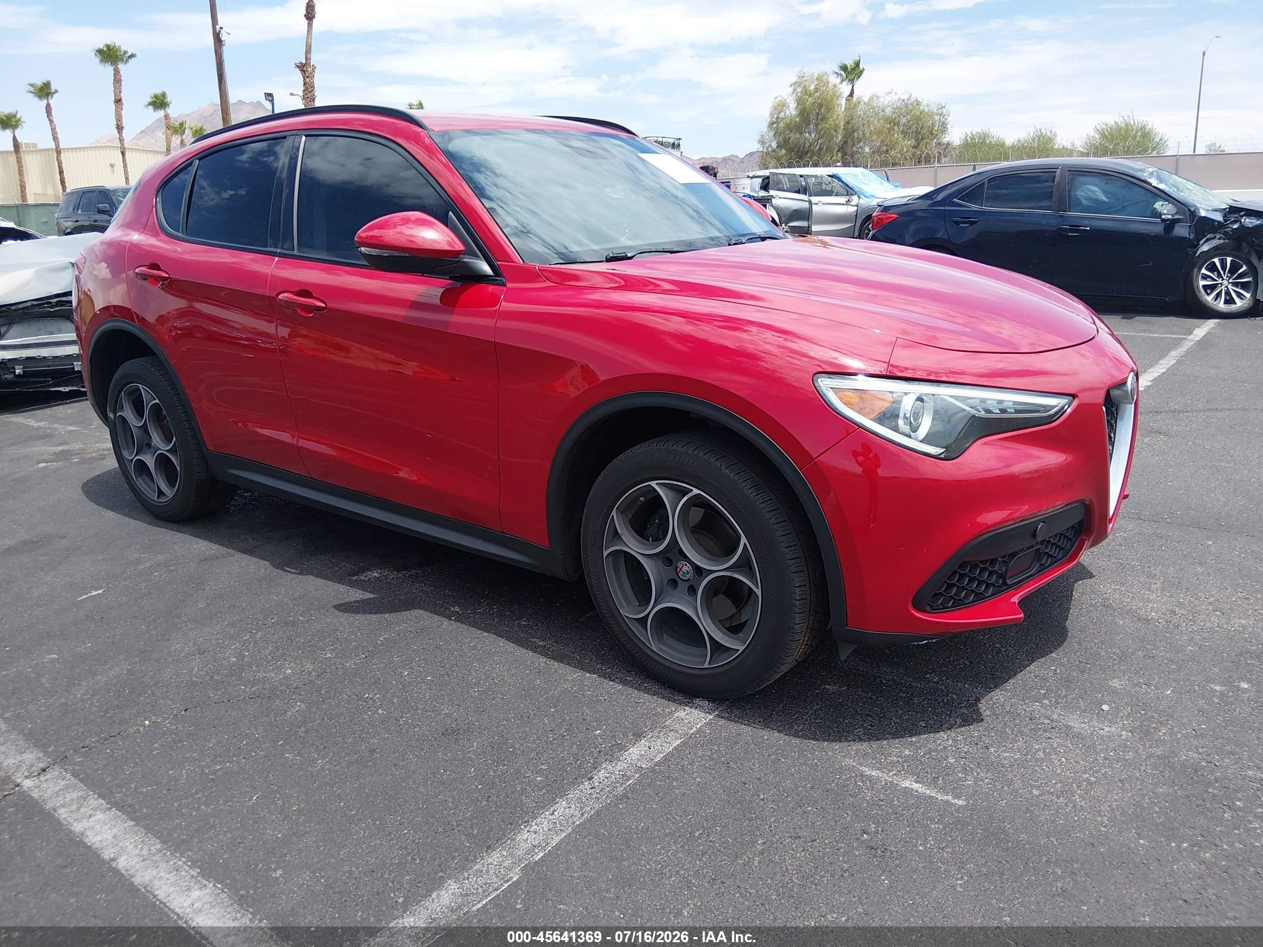 2018 Alfa romeo Stelvio VIN ZASFAKPN2J7B77203 IAAI salvage auction — Side, Salvage (Nevada), sold $5,500 on 2026-09-05 (photo 1)