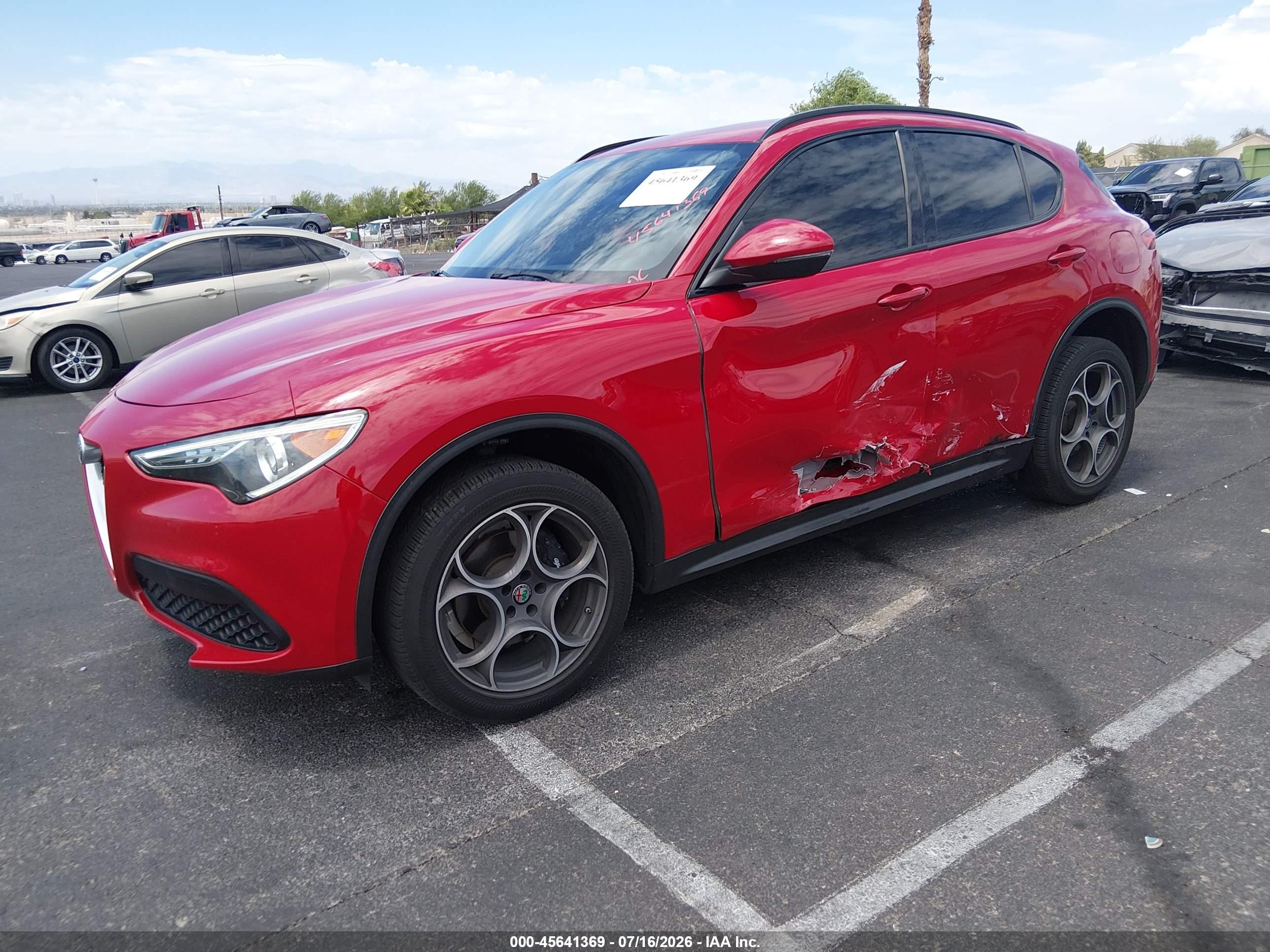 2018 Alfa romeo Stelvio VIN ZASFAKPN2J7B77203 IAAI salvage auction — Side, Salvage (Nevada), sold $5,500 on 2026-09-05 (photo 2)