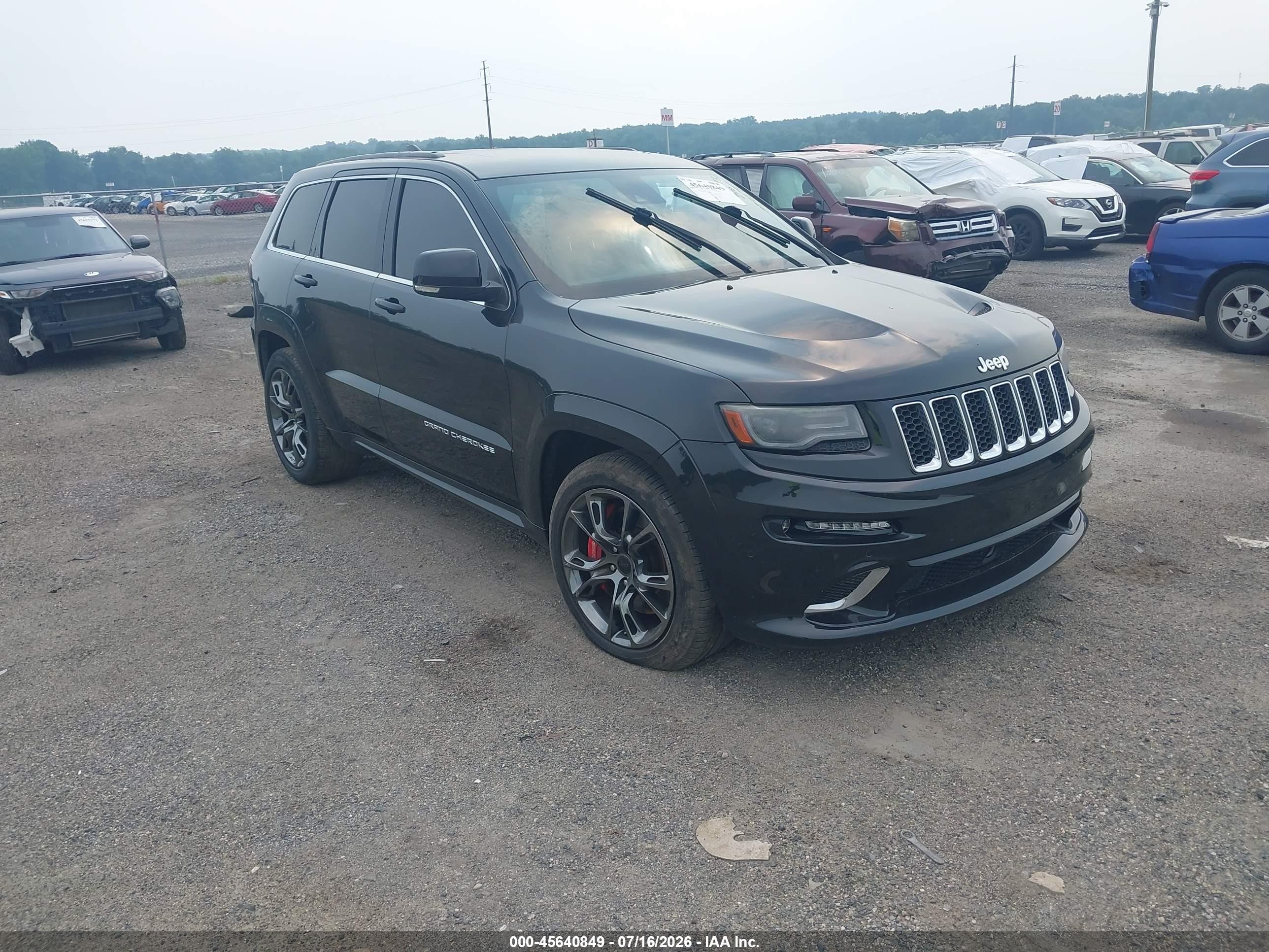 2014 Jeep Grand Cherokee VIN 1C4RJFDJ7EC125996 — IAAI salvage auction photo