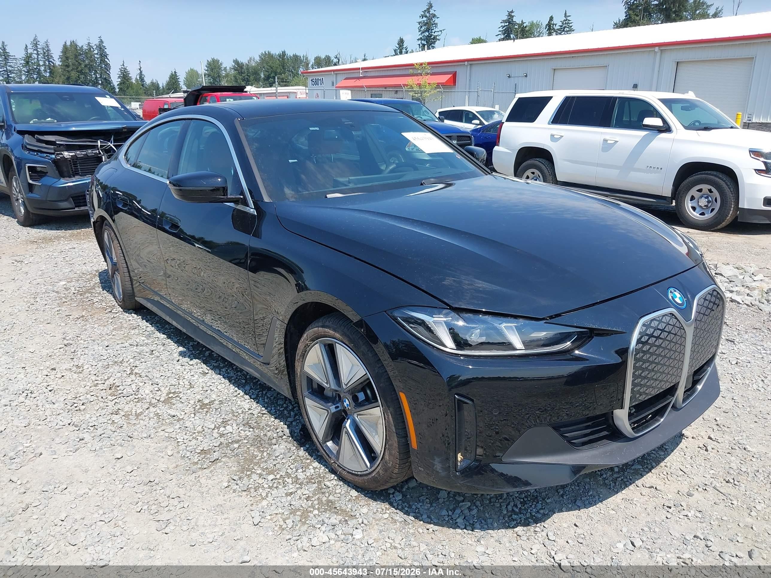 2025 BMW i4 VIN WBY23HD06SFU51621 — IAAI salvage auction photo