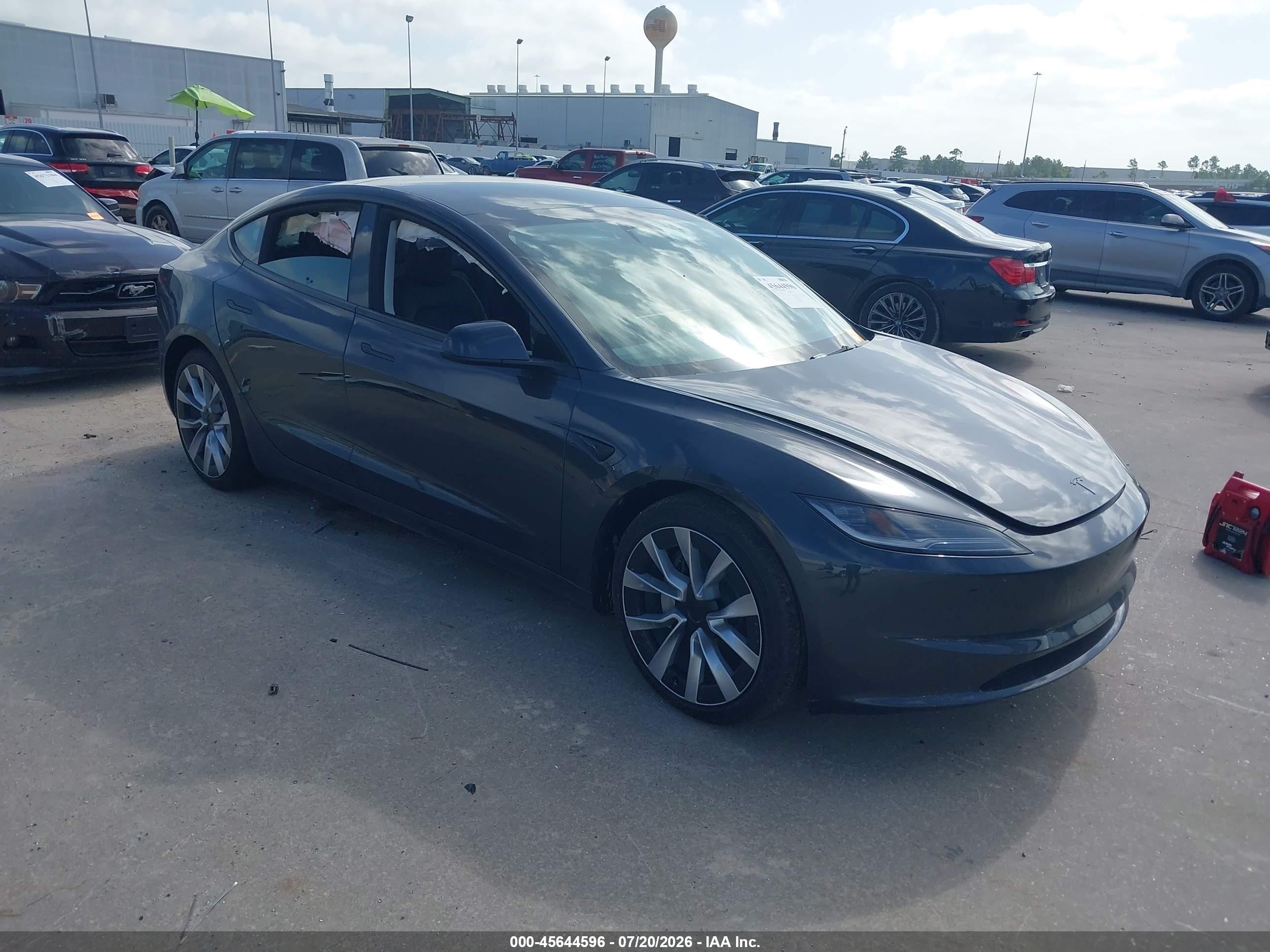 2026 Tesla Model 3 VIN 5YJ3E1EA6TF183576 IAAI salvage auction — Side, Wait Title, sold $10,900 on 2026-09-20 (photo 1)