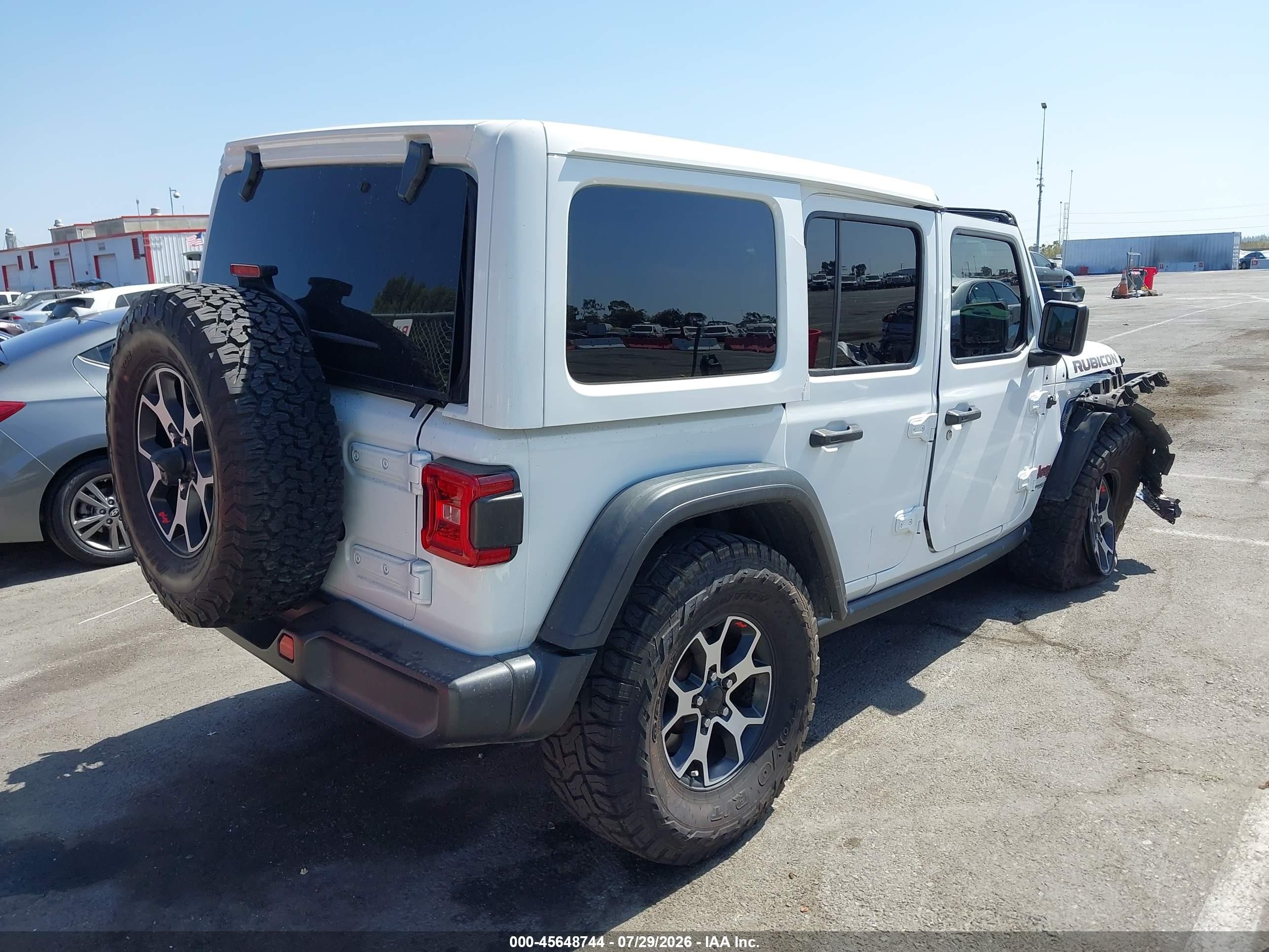 2021 Jeep Wrangler Unlimited VIN 1C4HJXFN4MW649993 IAAI salvage auction — All Over, Salvage (California), sold $7,300 on 2026-09-19 (photo 4)