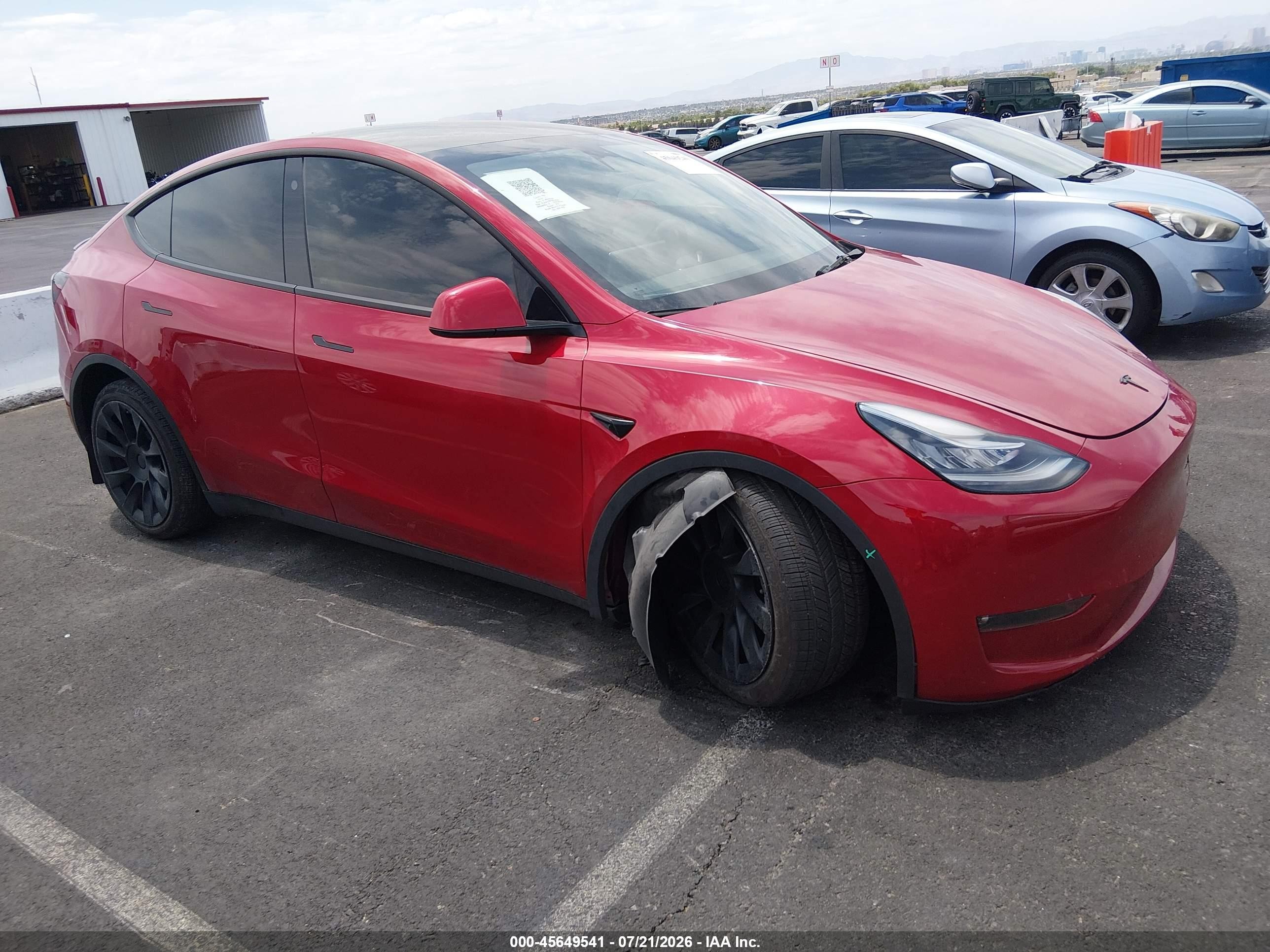2022 Tesla Model Y VIN 7SAYGAEE9NF396854 — IAAI salvage auction photo