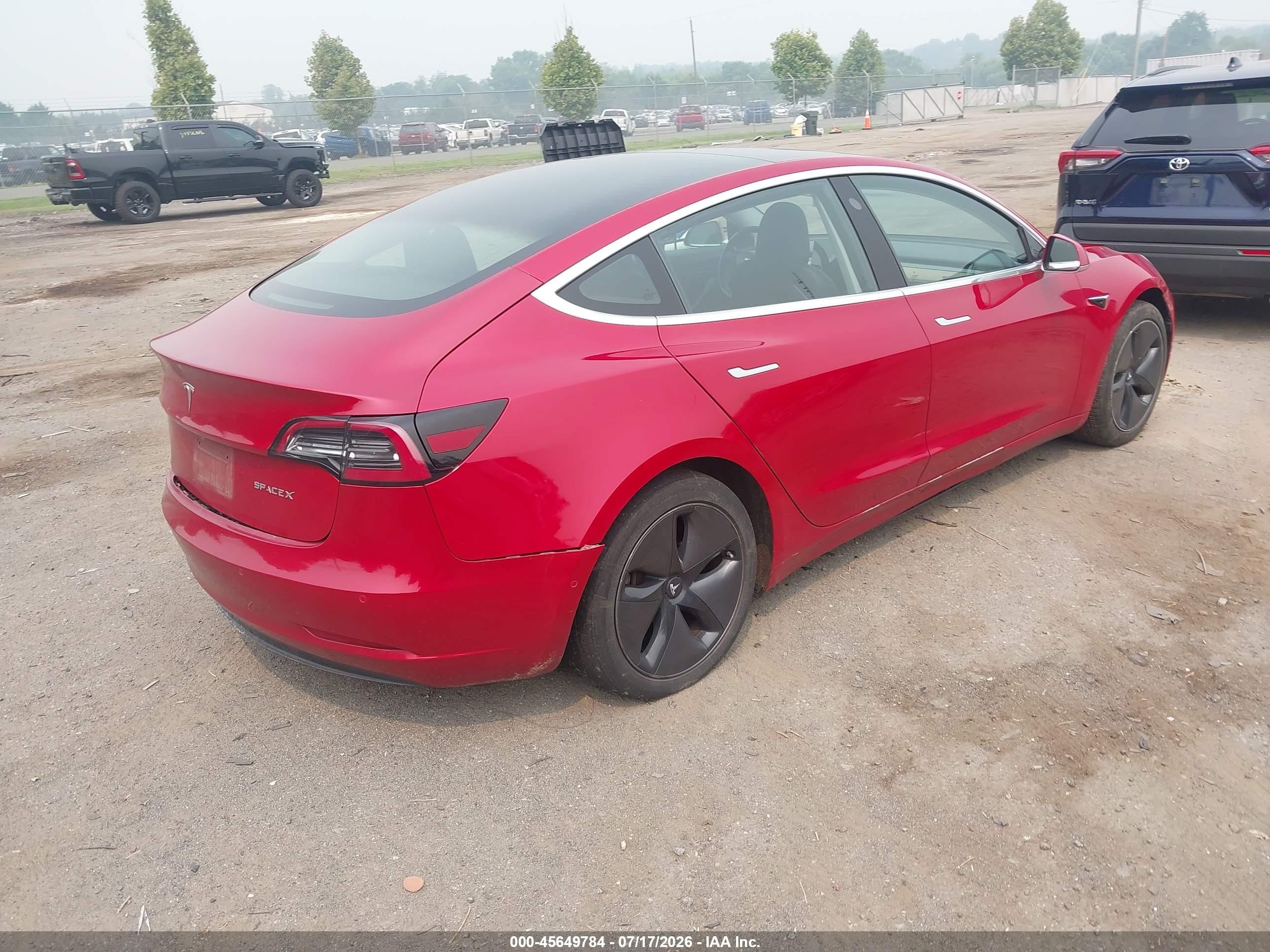 2018 Tesla Model 3 VIN 5YJ3E1EA6JF122970 IAAI salvage auction — Front & Rear, Salvage (Virginia), sold $3,200 on 2026-09-03 (photo 4)