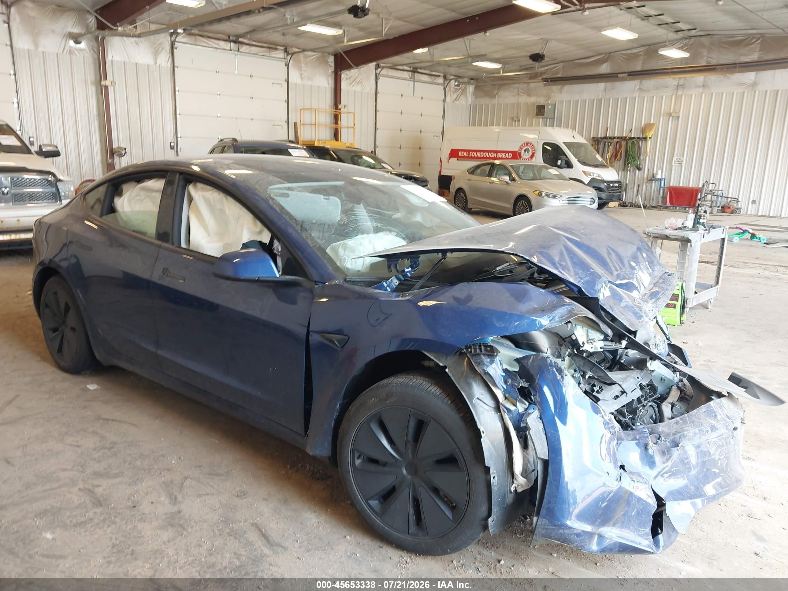 2025 Tesla Model 3 VIN 5YJ3E1EB4SF941101 — IAAI salvage auction photo