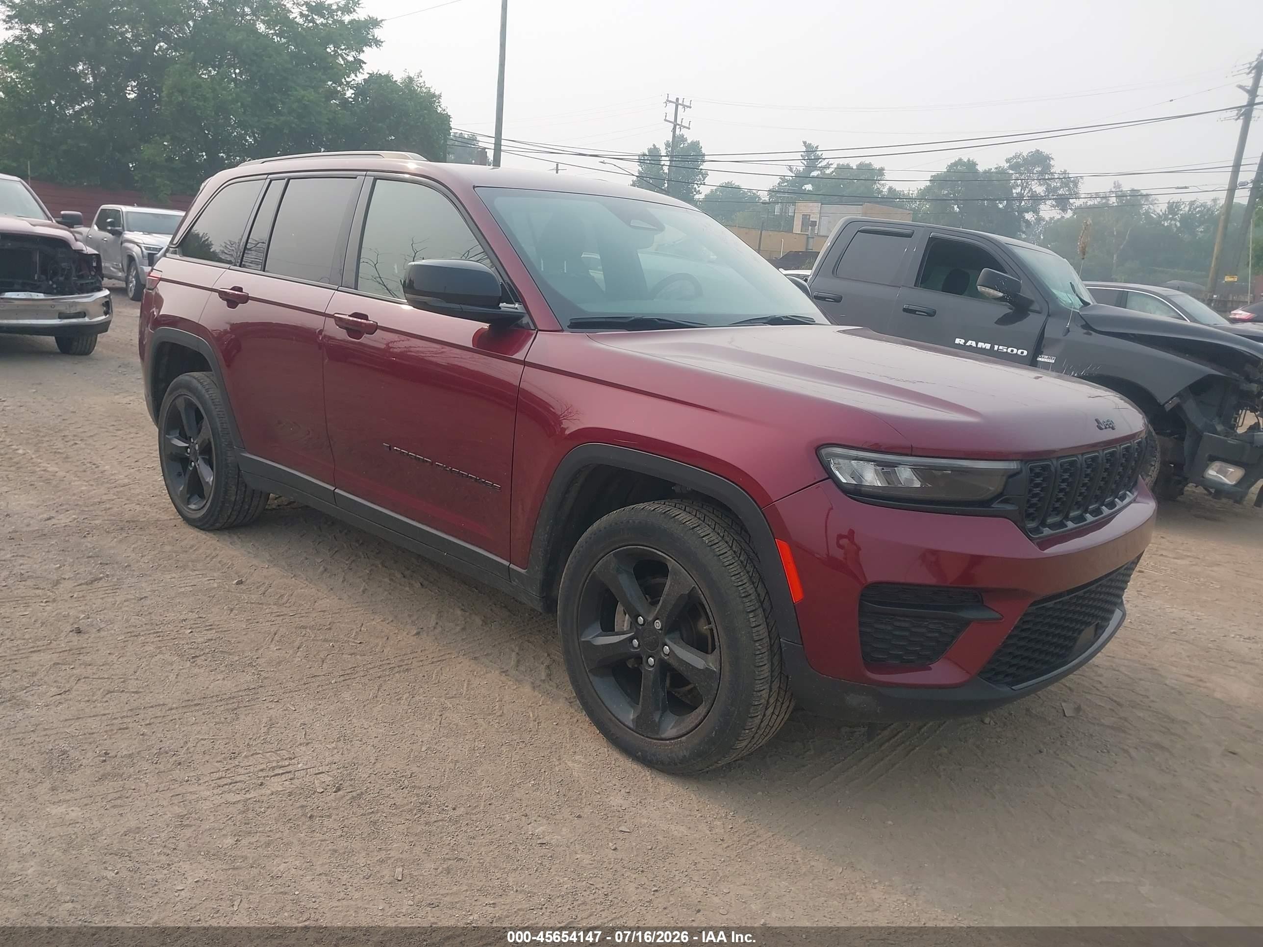 2023 Jeep Grand Cherokee VIN 1C4RJHAG0PC629815 — IAAI salvage auction photo