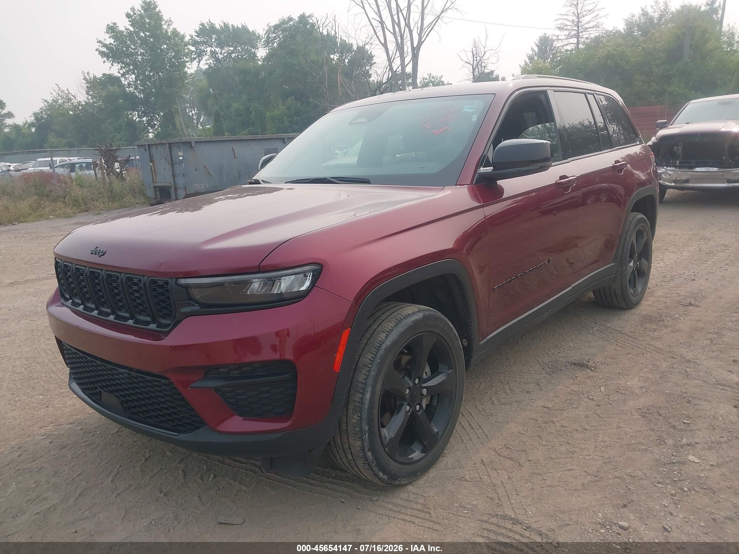 2023 Jeep Grand Cherokee VIN 1C4RJHAG0PC629815 IAAI salvage auction — Theft, Clear (Michigan), sold $13,900 on 2026-09-11 (photo 2)