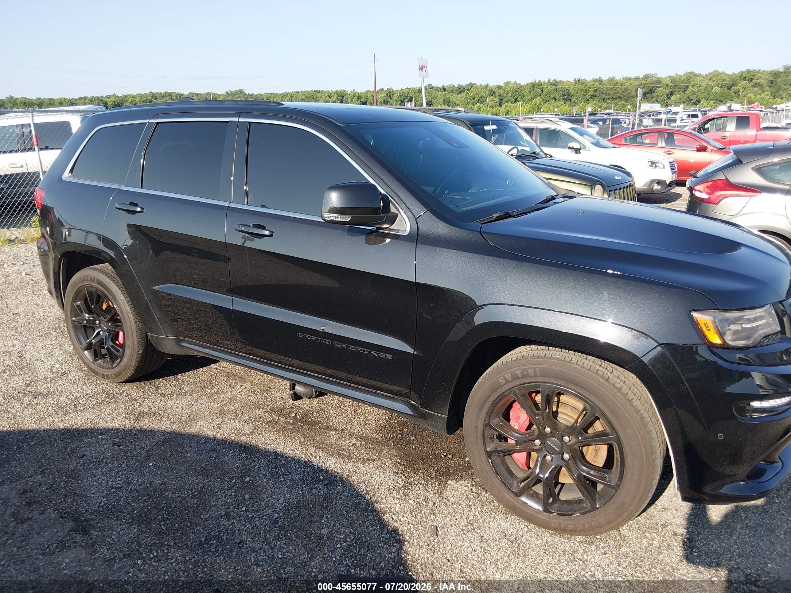 2014 Jeep Grand Cherokee VIN 1C4RJFDJ0EC151923 — IAAI salvage auction photo