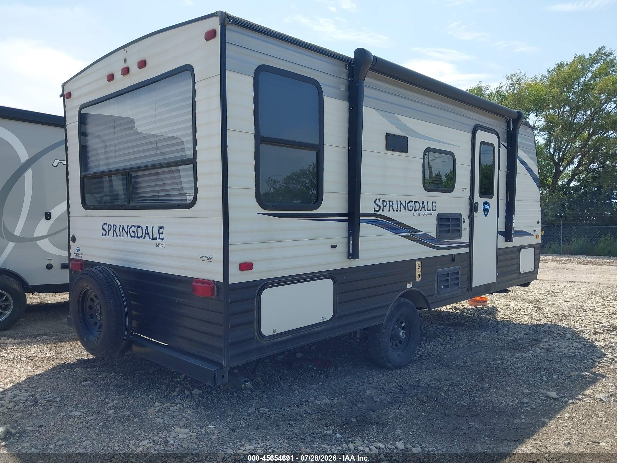 2021 Keystone Rv Springdale VIN 4YDT1751XMW103611 IAAI salvage auction — Hail, Salvage (Kansas), sold $2,400 on 2026-09-09 (photo 4)