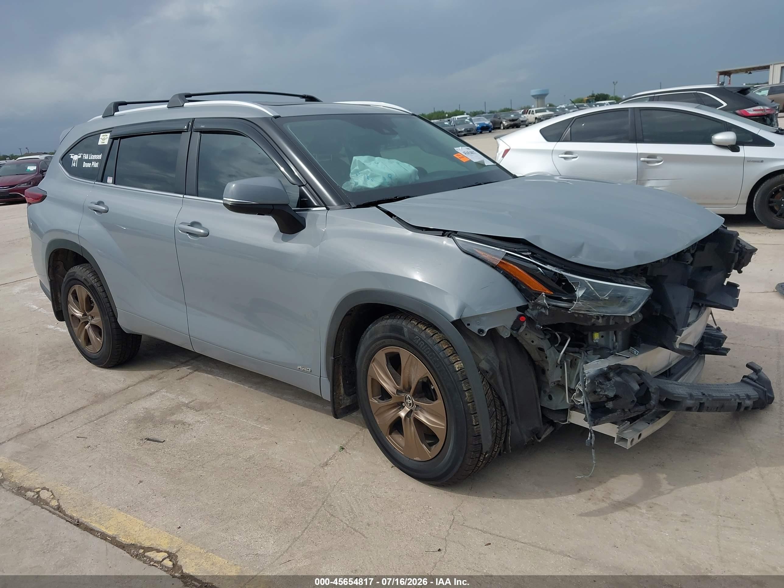 2023 Toyota Highlander Hybrid VIN 5TDABRCH9PS569490 — IAAI salvage auction photo