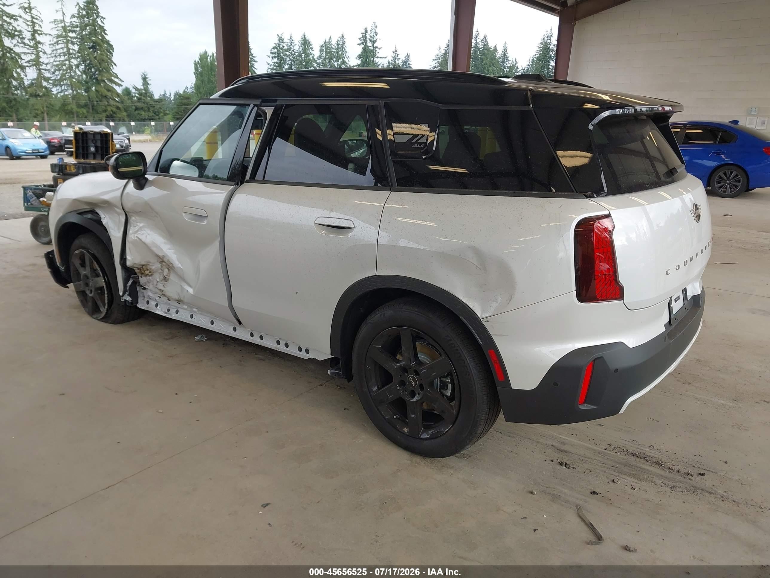 2026 Mini Countryman VIN WMZ23GA00T7V31038 IAAI salvage auction — Side, Bill Of Sale (Washington), sold $10,800 on 2026-09-07 (photo 3)
