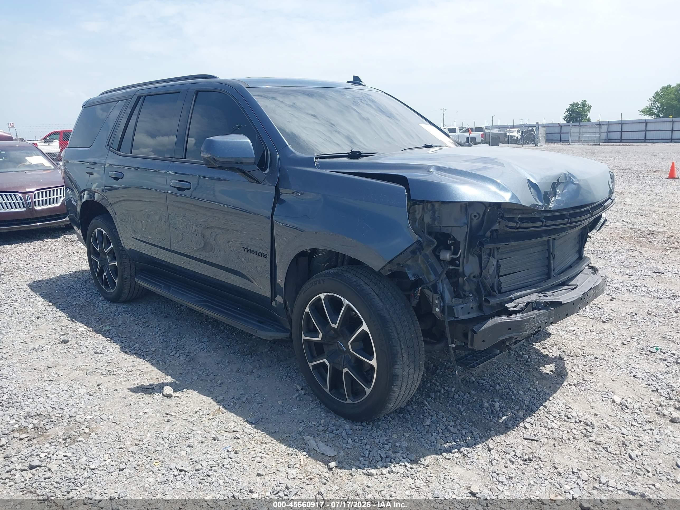 2021 Chevrolet Tahoe VIN 1GNSCRKD5MR199723 — IAAI salvage auction photo
