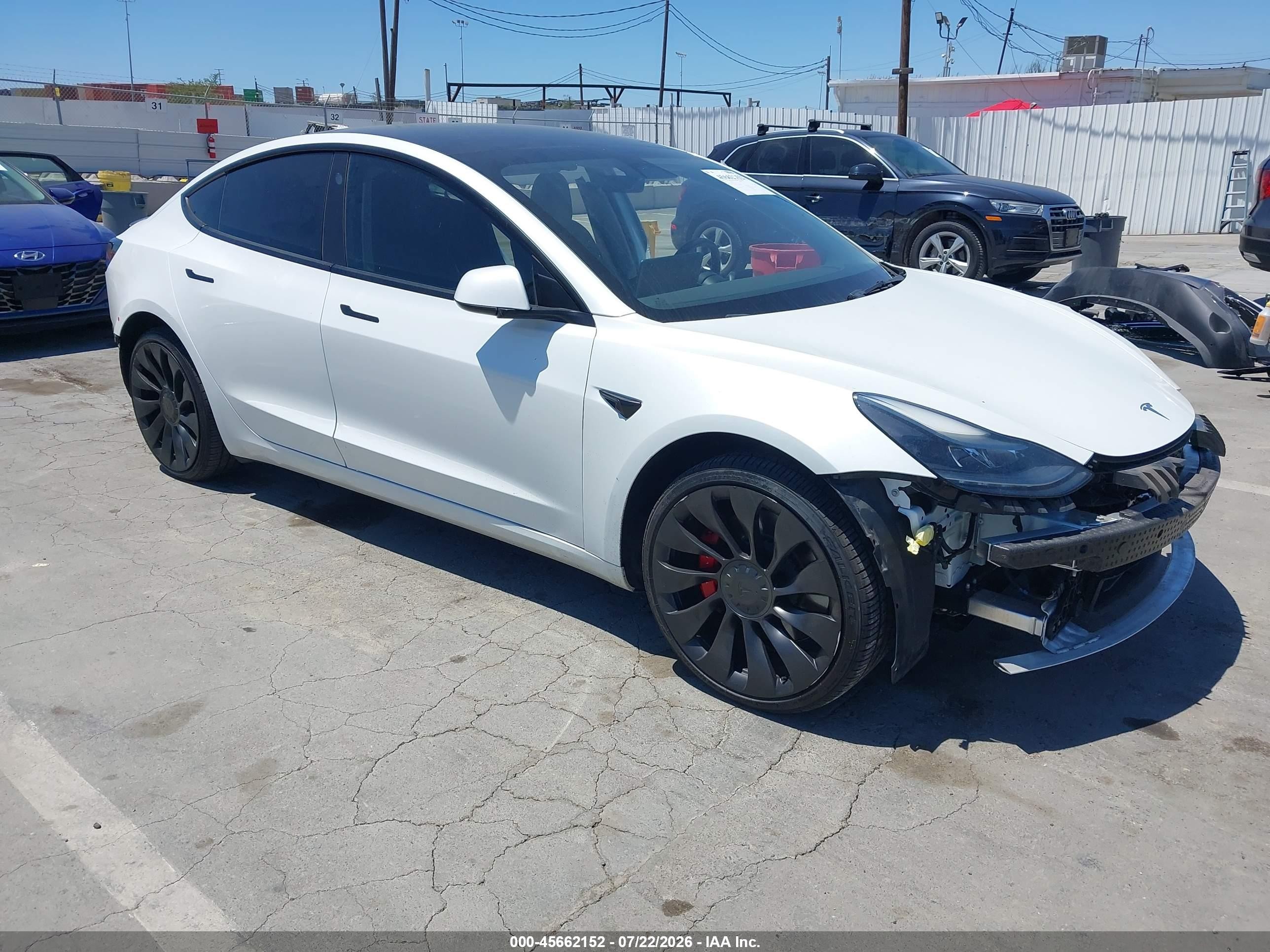 2022 Tesla Model 3 VIN 5YJ3E1EC9NF254757 — IAAI salvage auction photo