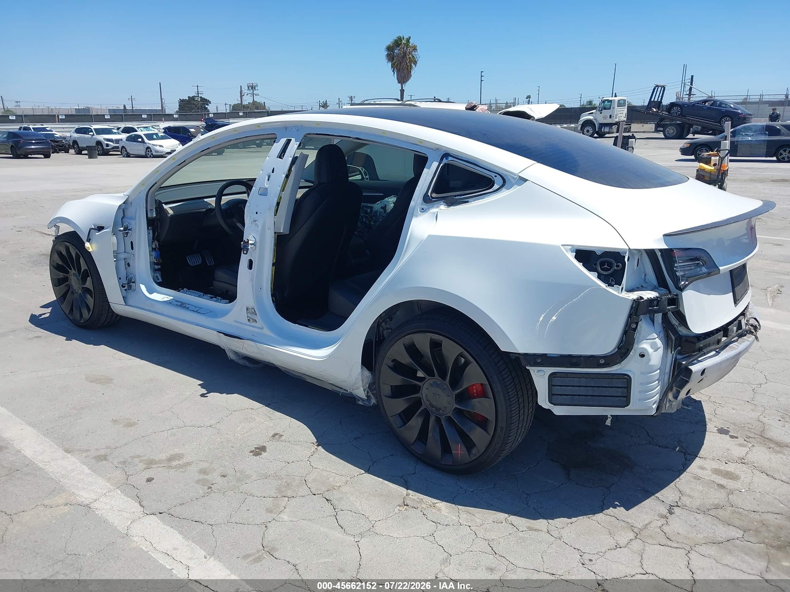 2022 Tesla Model 3 VIN 5YJ3E1EC9NF254757 IAAI salvage auction — Side, Salvage (California), sold $7,400 on 2026-09-13 (photo 3)