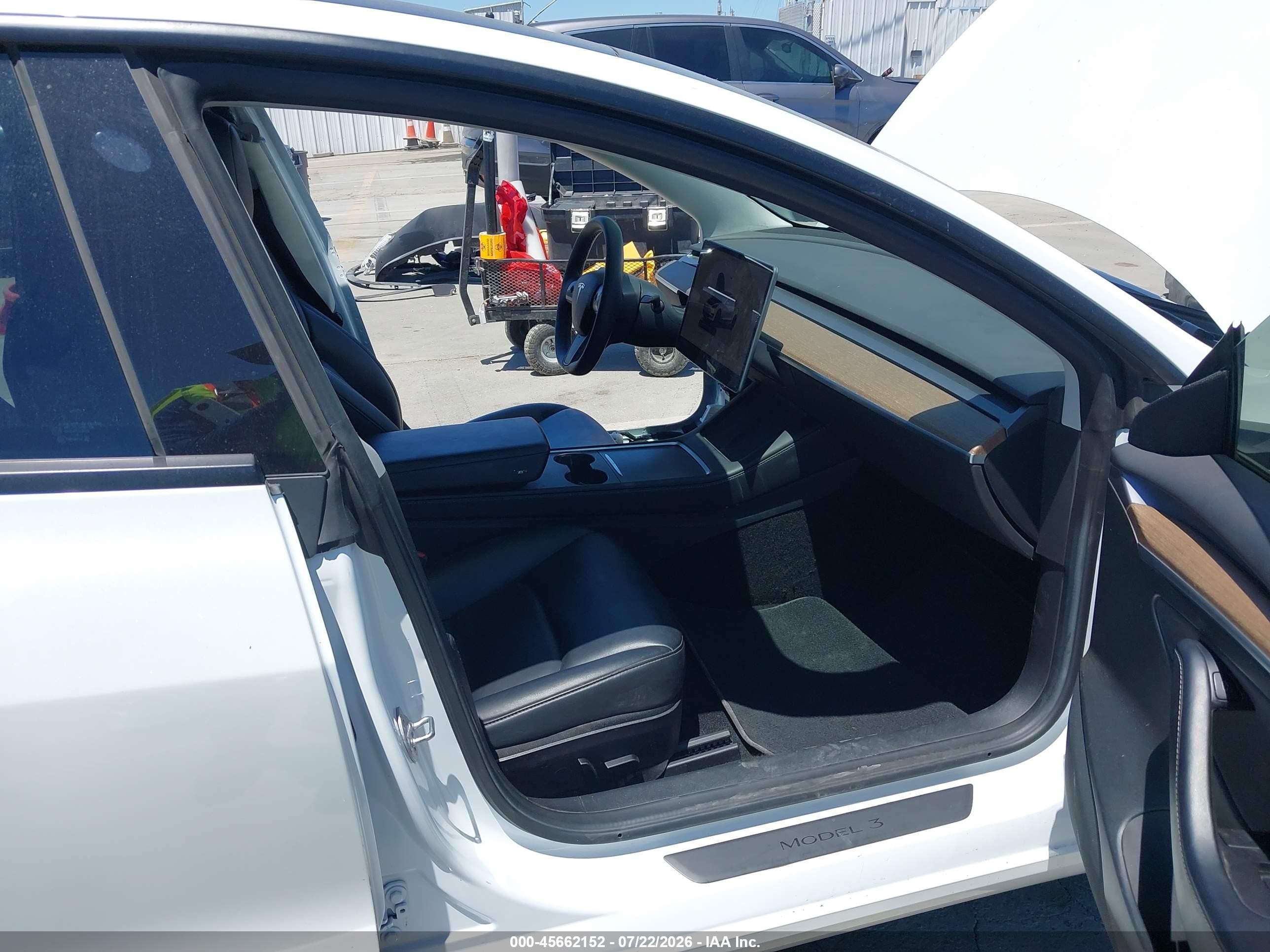 2022 Tesla Model 3 VIN 5YJ3E1EC9NF254757 IAAI salvage auction — Side, Salvage (California), sold $7,400 on 2026-09-13 (photo 5)
