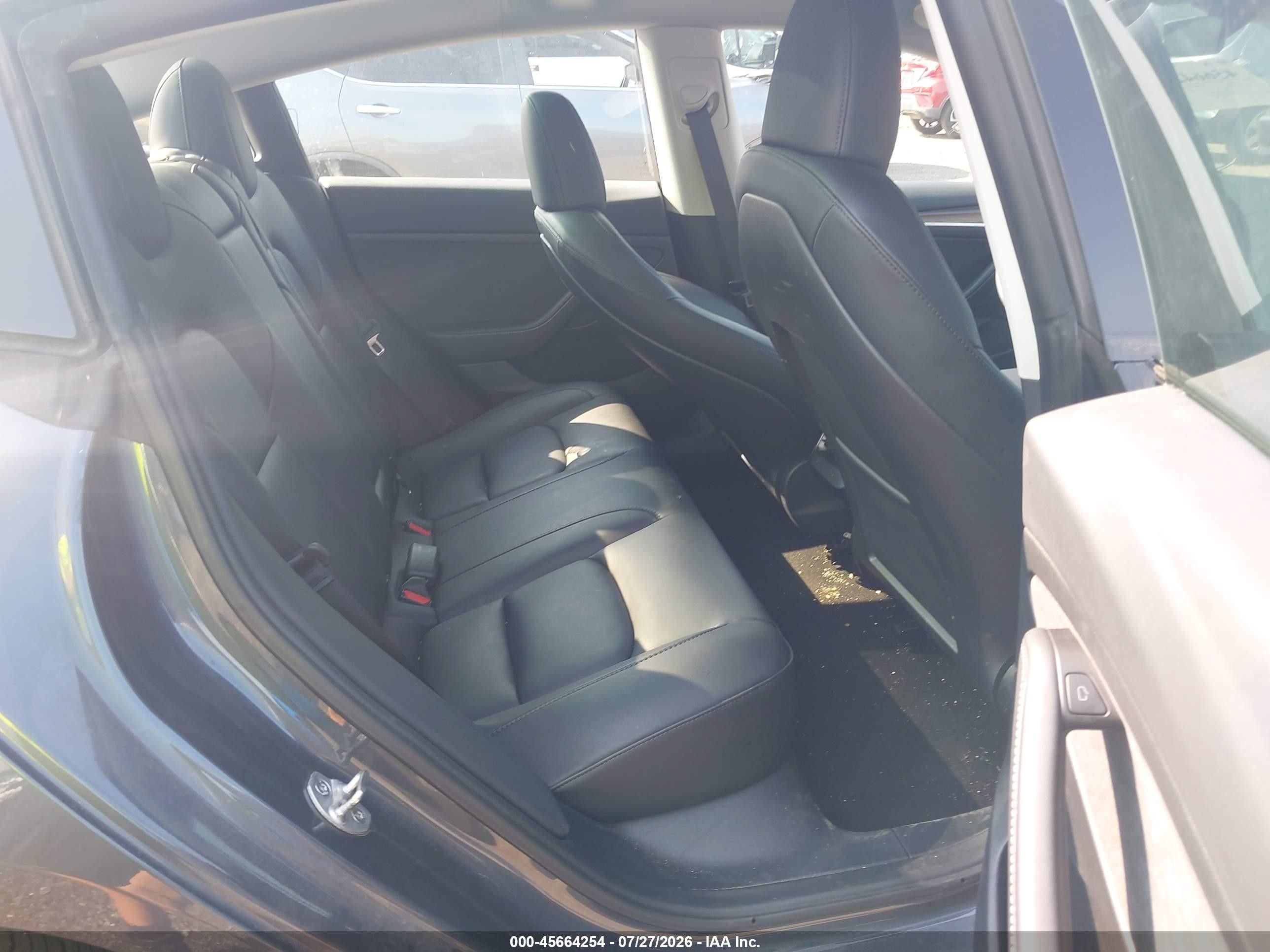 2023 Tesla Model 3 VIN 5YJ3E1EA2PF701799 IAAI salvage auction — Side, Salvage (Idaho), sold $8,600 on 2026-09-05 (photo 8)