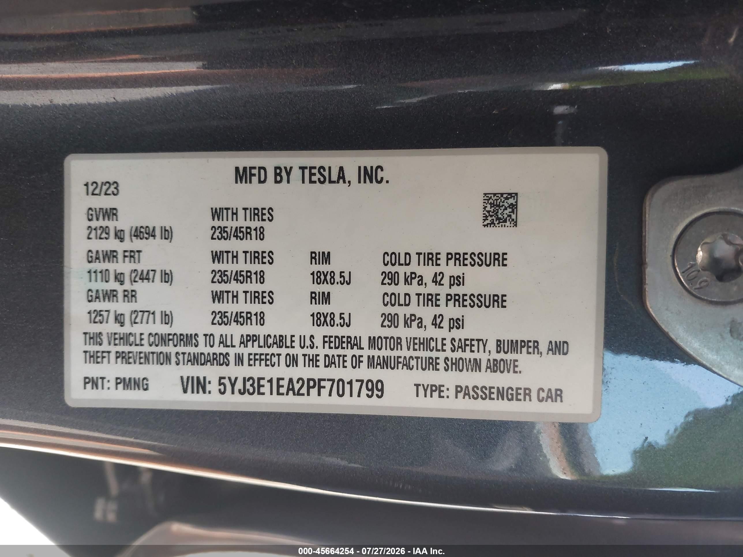 2023 Tesla Model 3 VIN 5YJ3E1EA2PF701799 IAAI salvage auction — Side, Salvage (Idaho), sold $8,600 on 2026-09-05 (photo 9)