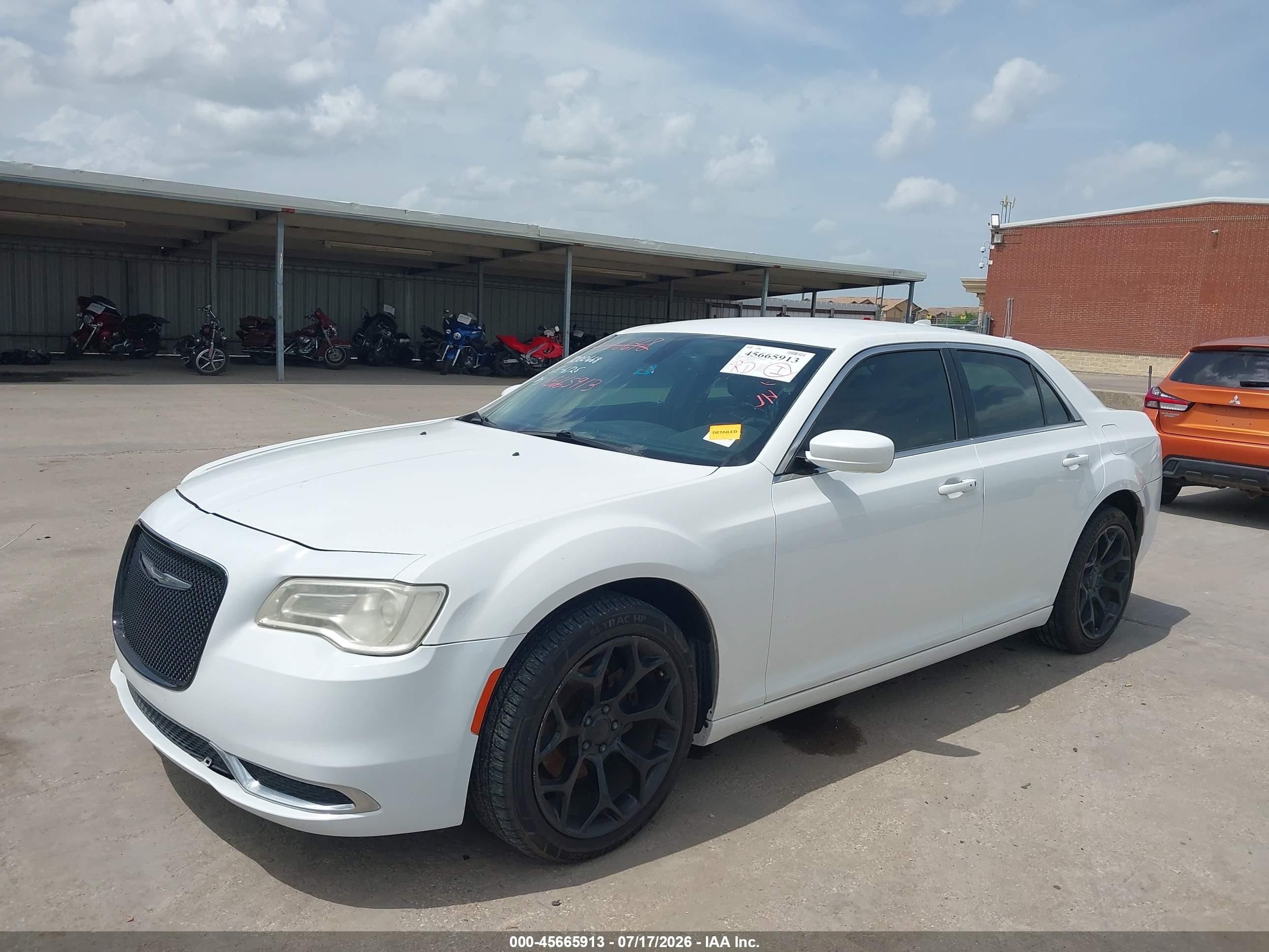 2016 Chrysler 300 VIN 2C3CCAAG2GH334448 IAAI salvage auction — Water/Flood, Original (Texas), sold $1,400 on 2026-09-09 (photo 2)
