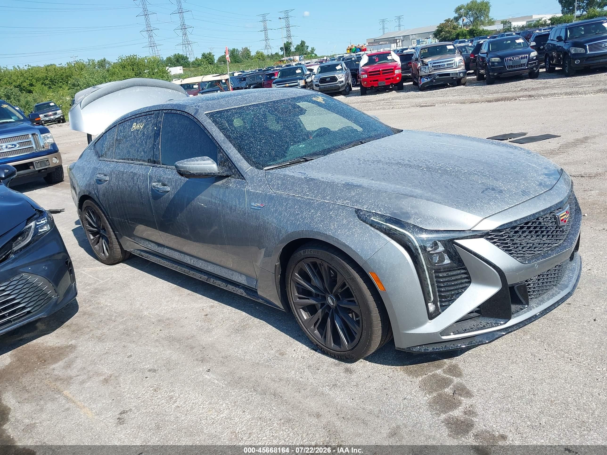 2025 Cadillac CT5 VIN 1G6D25R68S0860072 IAAI salvage auction — Side, Salvage (Illinois), sold $46,000 on 2026-09-23 (photo 1)