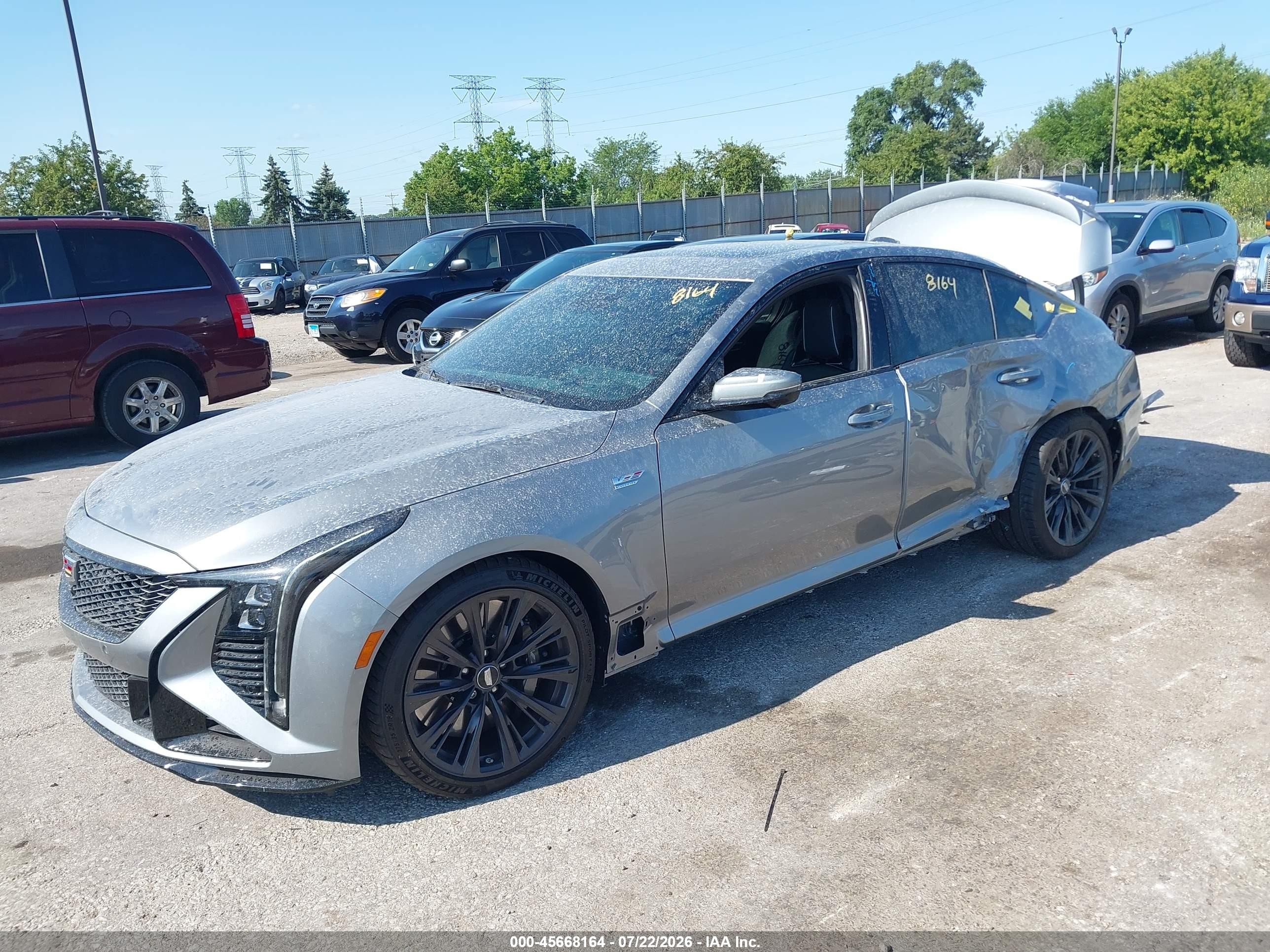 2025 Cadillac CT5 VIN 1G6D25R68S0860072 IAAI salvage auction — Side, Salvage (Illinois), sold $46,000 on 2026-09-23 (photo 2)