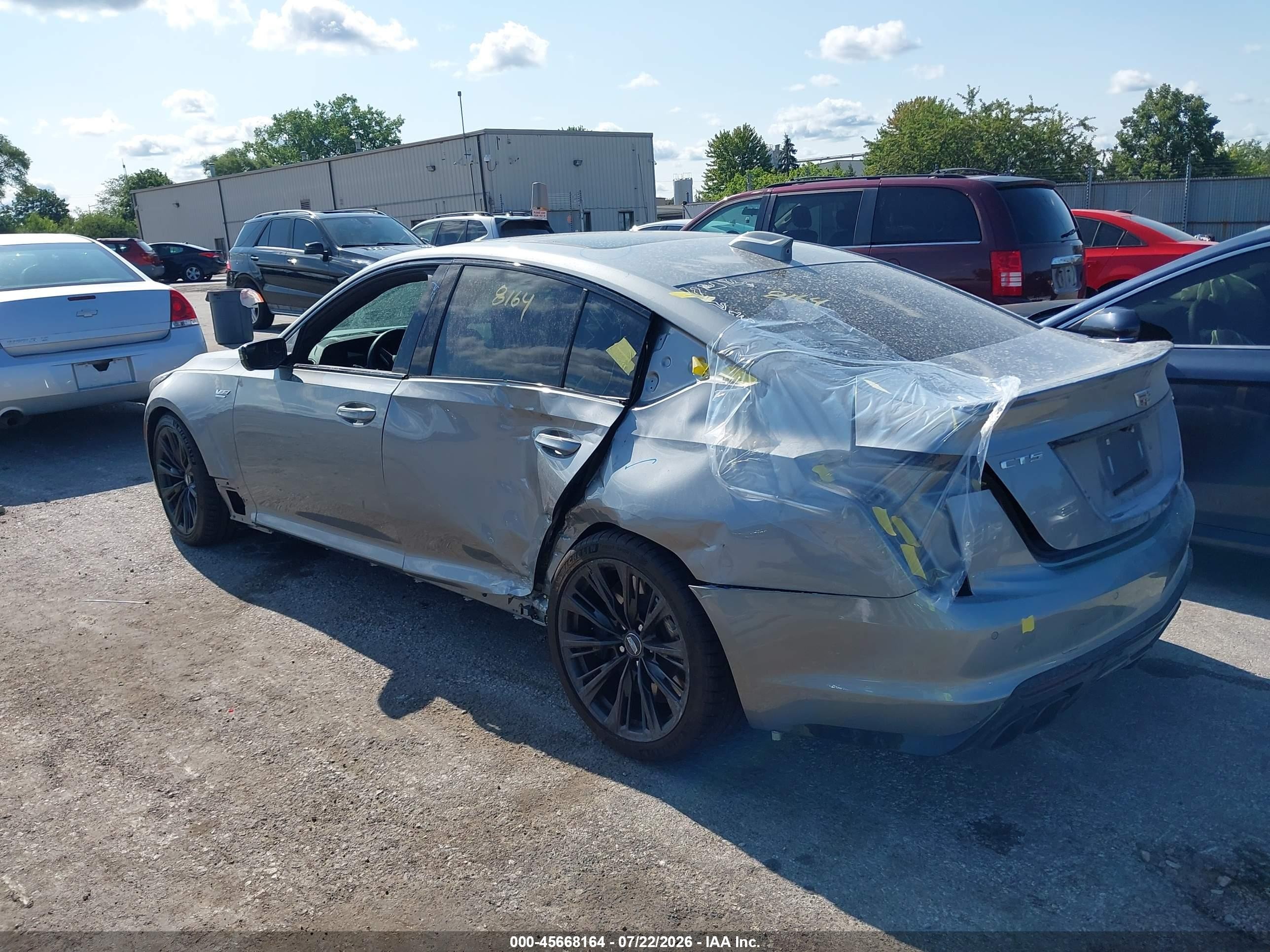2025 Cadillac CT5 VIN 1G6D25R68S0860072 IAAI salvage auction — Side, Salvage (Illinois), sold $46,000 on 2026-09-23 (photo 3)