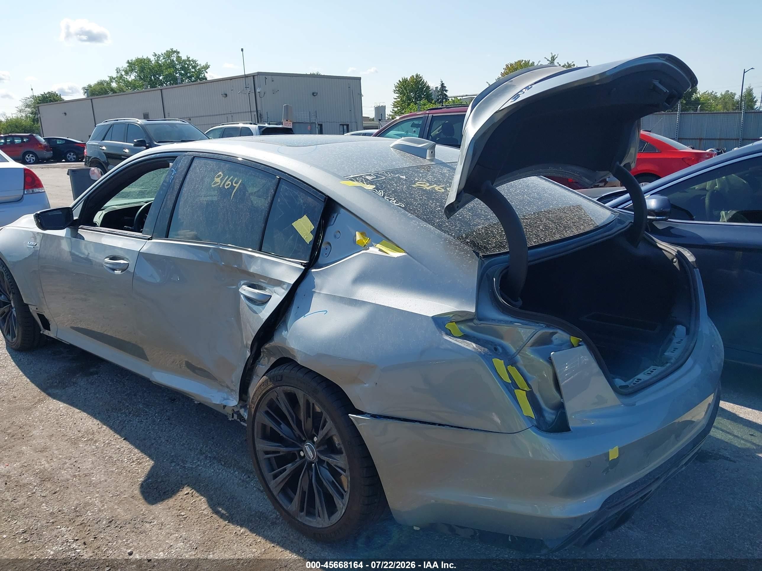 2025 Cadillac CT5 VIN 1G6D25R68S0860072 IAAI salvage auction — Side, Salvage (Illinois), sold $46,000 on 2026-09-23 (photo 6)