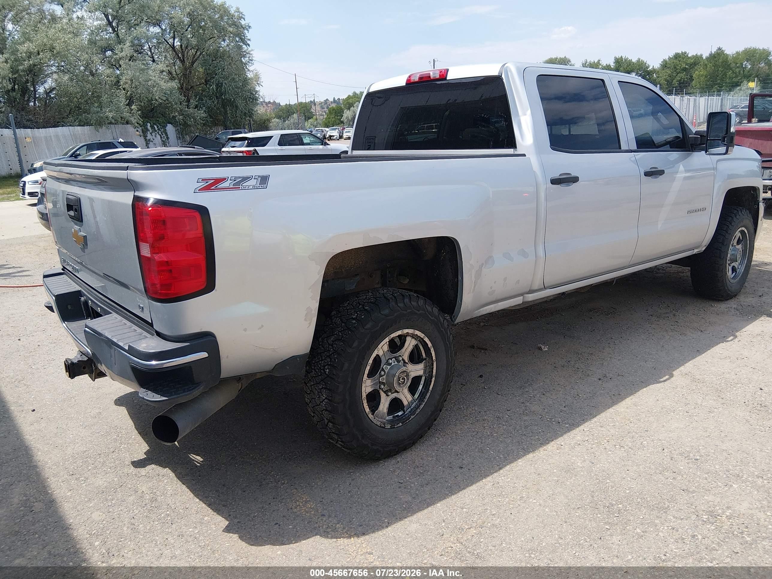 2015 Chevrolet Silverado 2500 VIN 1GC1KVE8XFF182130 IAAI salvage auction — Rollover, Salvage (Montana), sold $8,500 on 2026-09-16 (photo 4)