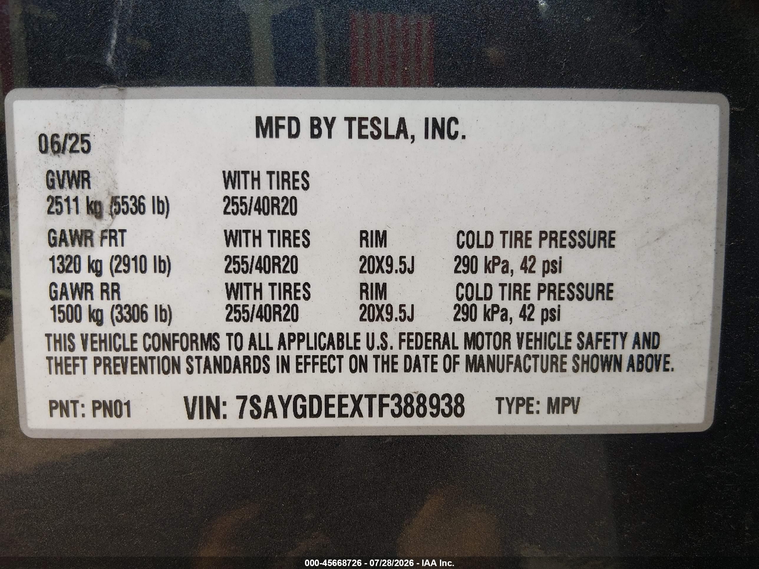 2026 Tesla Model y VIN 7SAYGDEEXTF388938 IAAI salvage auction — Side, Salvage (Idaho), sold $25,250 on 2026-10-08 (photo 9)