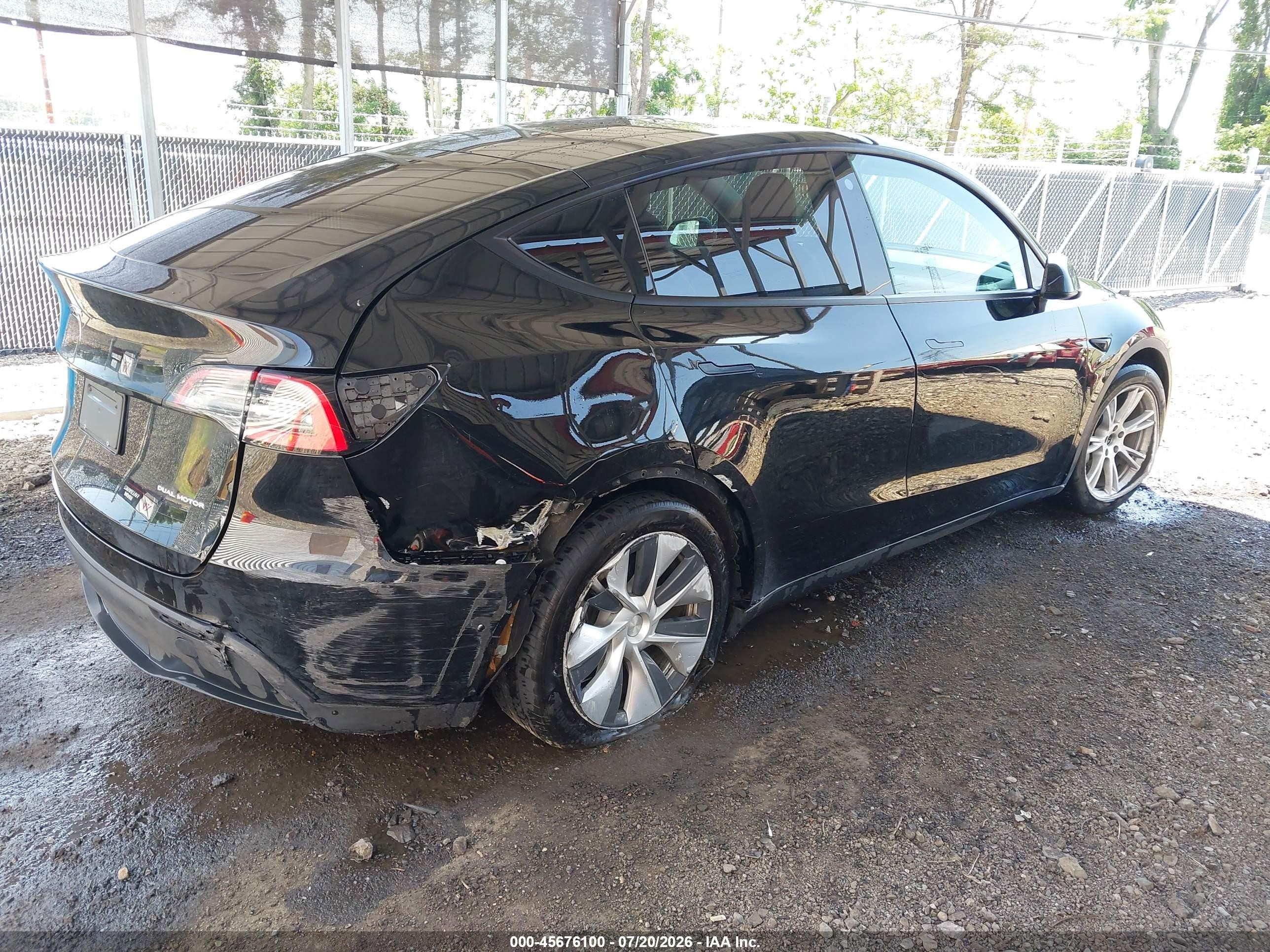2021 Tesla Model Y VIN 5YJYGAEE0MF112605 IAAI salvage auction — Rear End, Salvage (Delaware), sold $6,300 on 2026-10-12 (photo 4)
