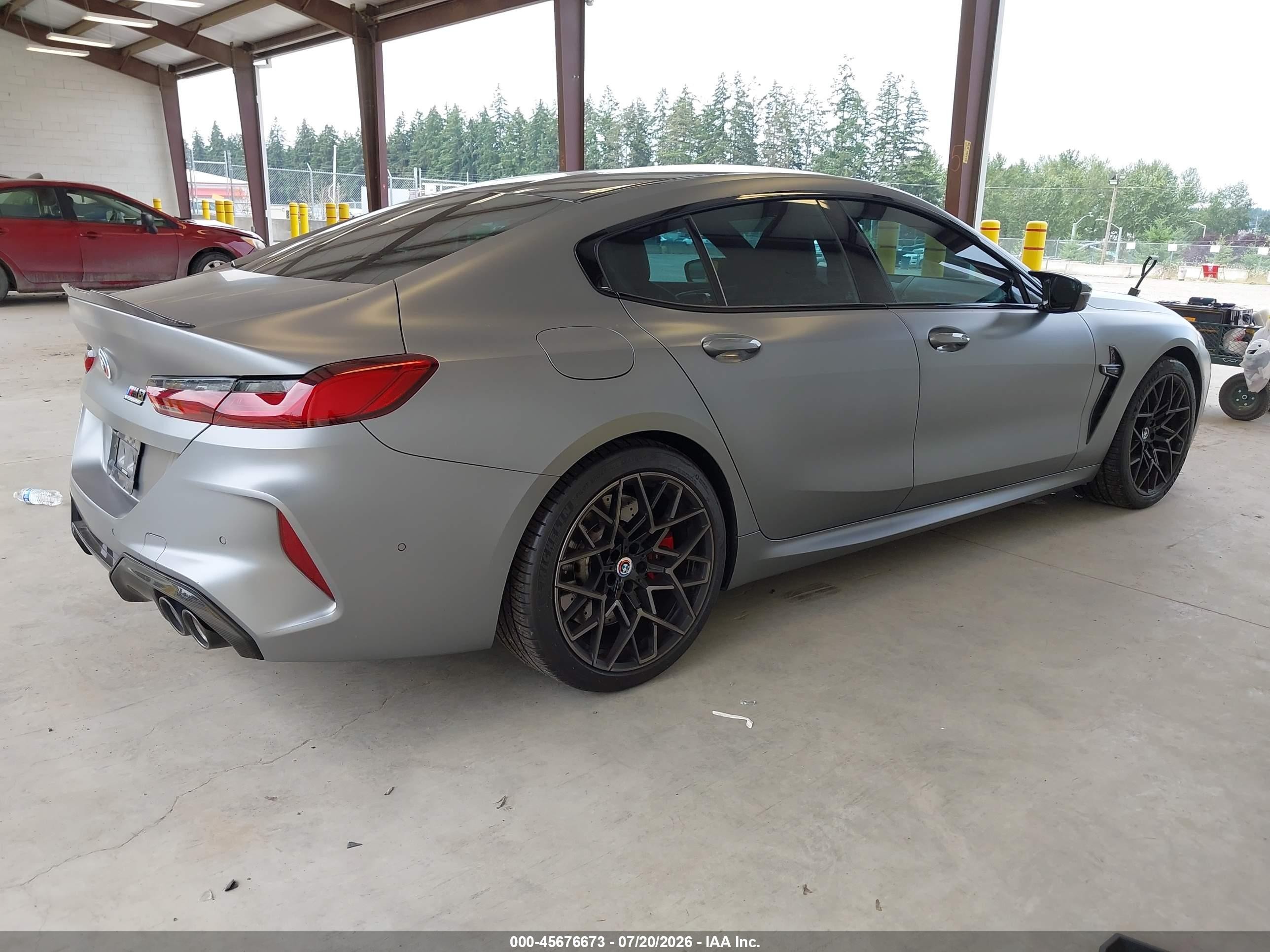 2023 BMW M8 VIN WBSGV0C09PCL06210 IAAI salvage auction — Side, Bill Of Sale (Washington), sold $46,000 on 2026-08-10 (photo 4)