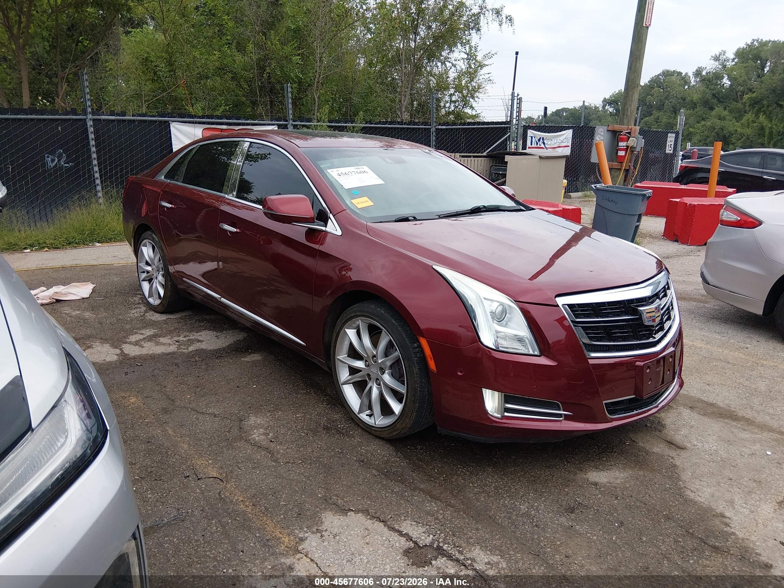 2016 Cadillac XTS VIN 2G61P5S31G9180225 IAAI salvage auction — Side, Wait Title, sold $1,300 on 2026-09-20 (photo 1)