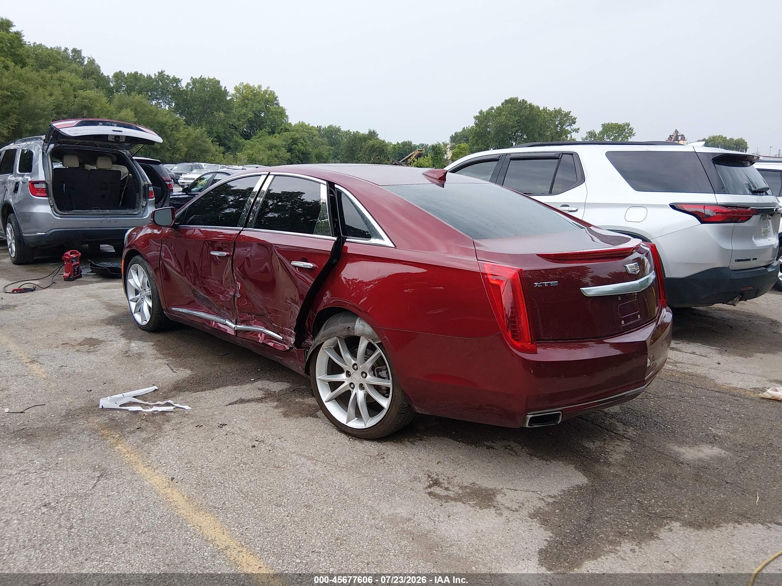 2016 Cadillac XTS VIN 2G61P5S31G9180225 IAAI salvage auction — Side, Wait Title, sold $1,300 on 2026-09-20 (photo 3)