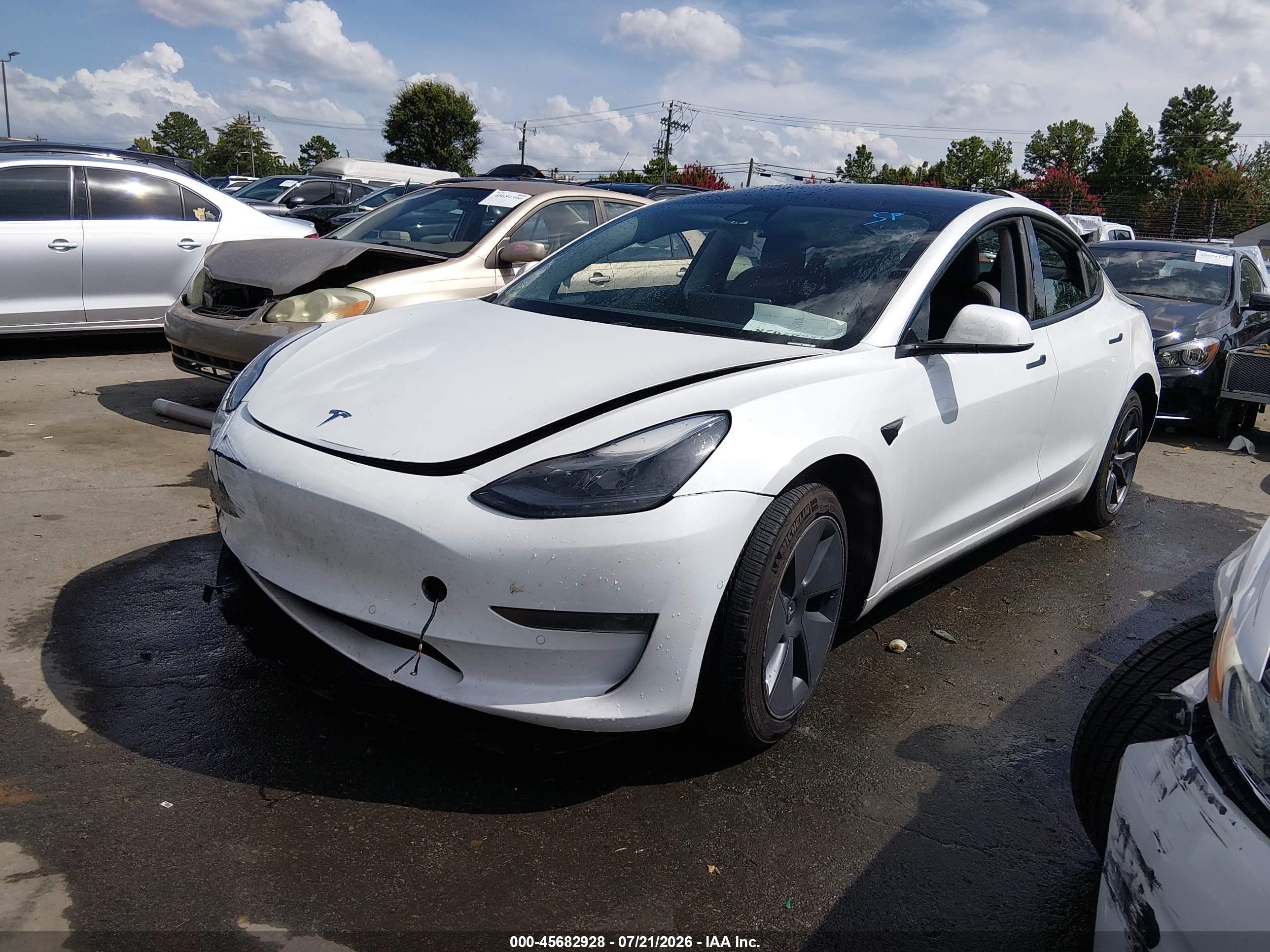 2022 Tesla Model 3 VIN 5YJ3E1EA1NF320264 IAAI salvage auction — Front & Rear, Salvage (Georgia), sold $4,750 on 2026-09-12 (photo 2)