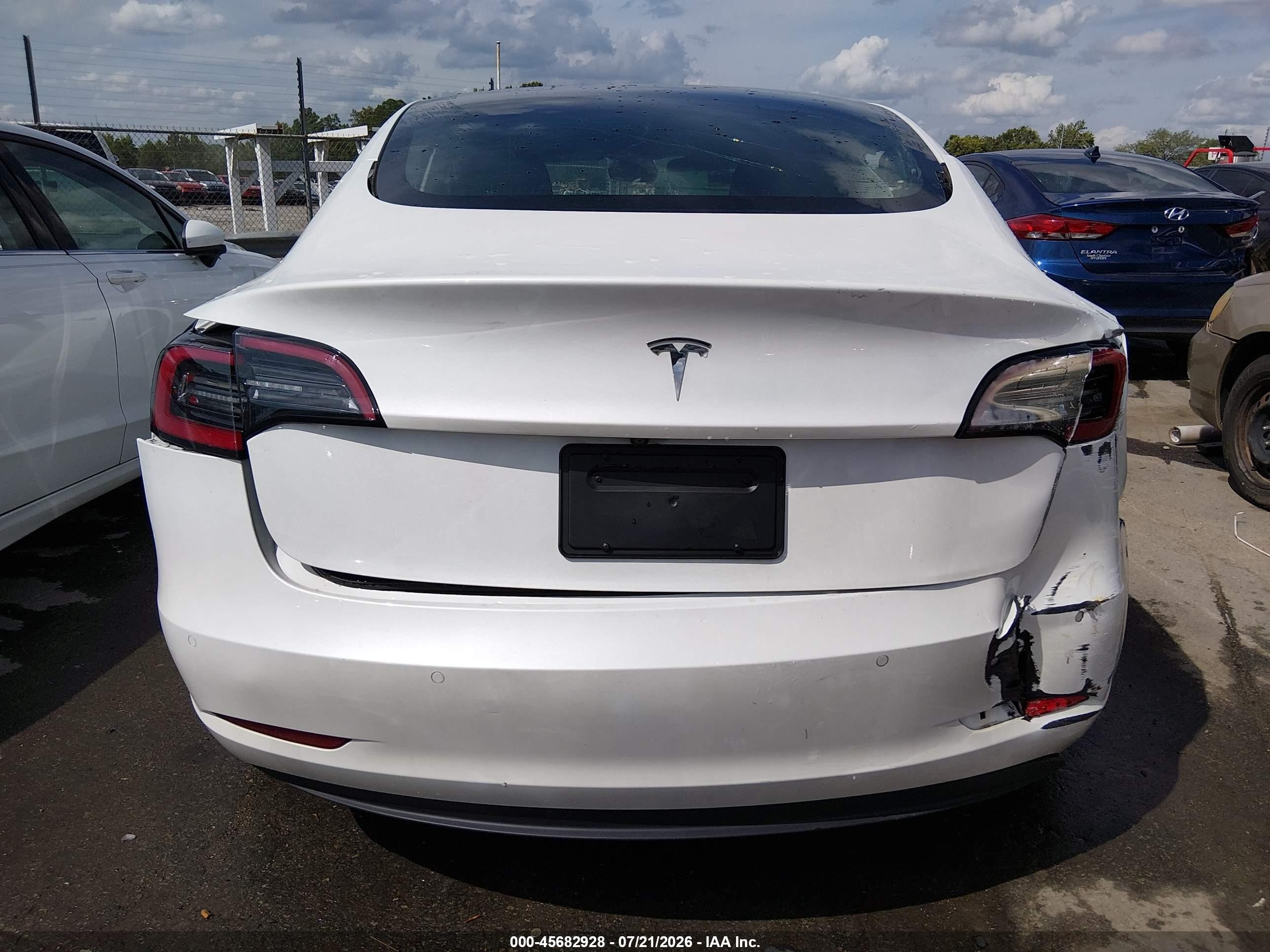 2022 Tesla Model 3 VIN 5YJ3E1EA1NF320264 IAAI salvage auction — Front & Rear, Salvage (Georgia), sold $4,750 on 2026-09-12 (photo 6)