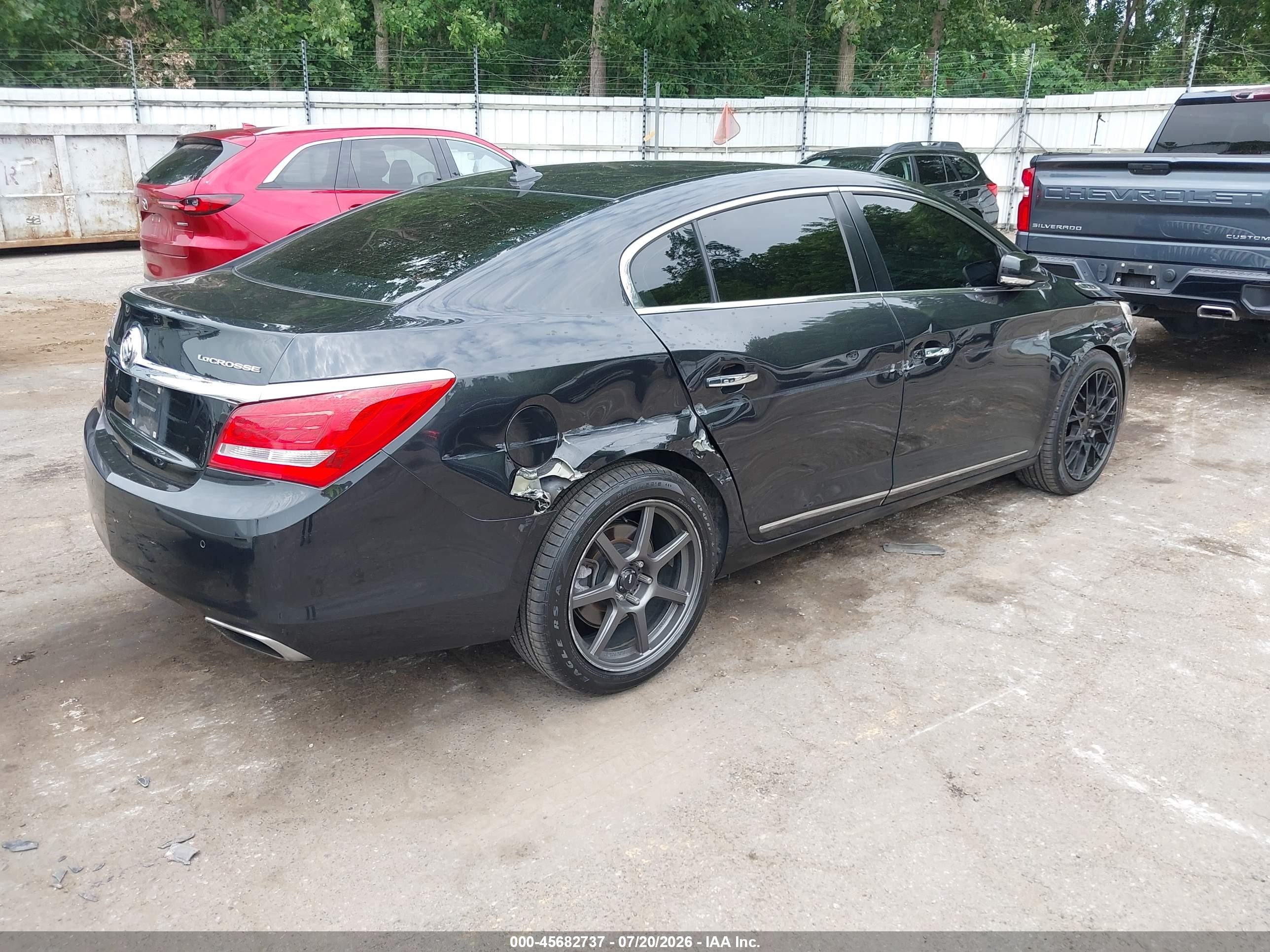 2014 Buick Lacrosse VIN 1G4GD5G3XEF131355 IAAI salvage auction — Side, Clear (Michigan), sold $850 on 2026-09-08 (photo 4)